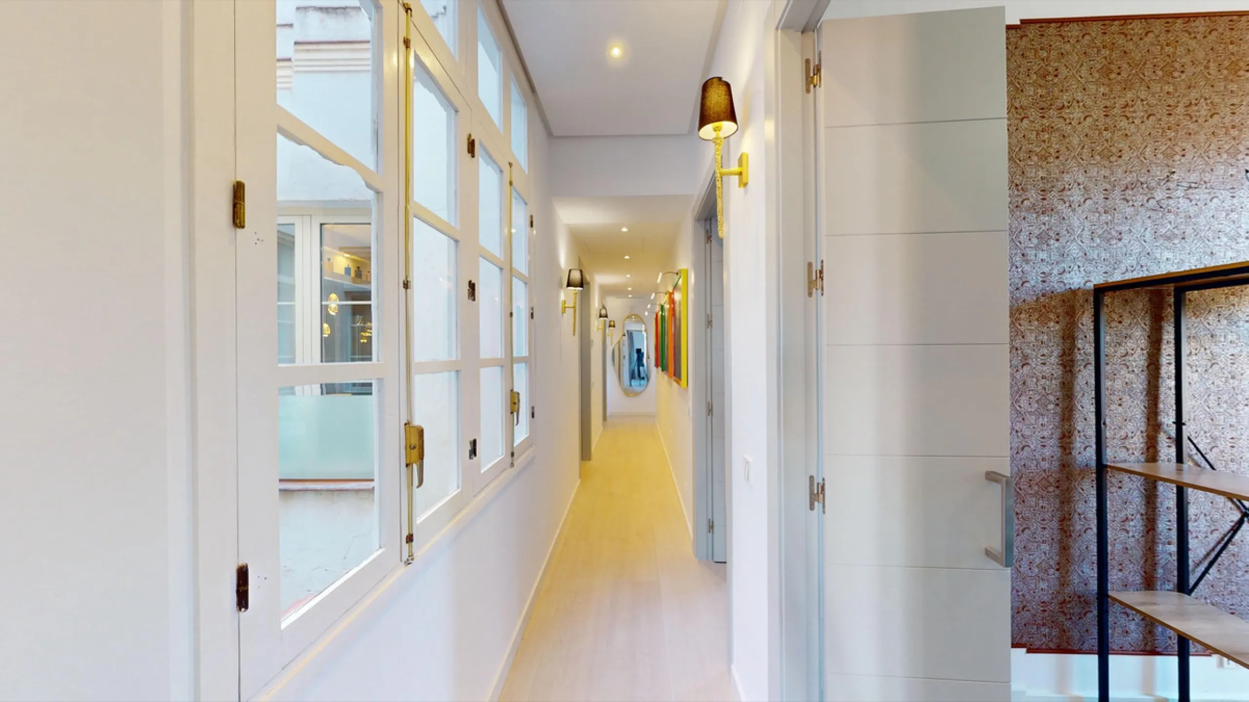 Experience this beautifully renovated top floor apartment in a stylish blend of luxury, aristocracy, and modern design. Located on the third floor (with elevator access), this south-west facing apartment is flooded with natural light and boasts high ceili