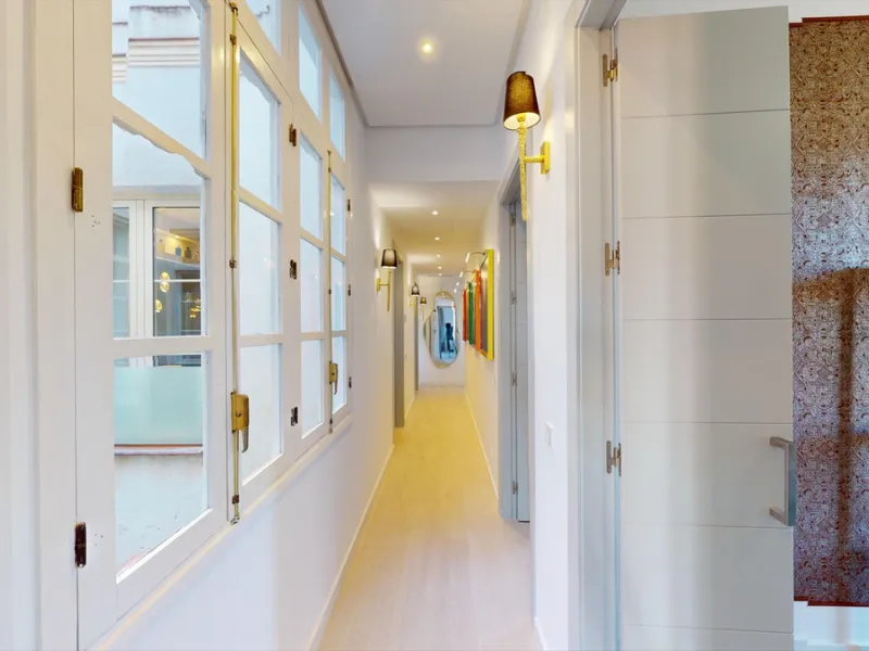 Experience this beautifully renovated top floor apartment in a stylish blend of luxury, aristocracy, and modern design. Located on the third floor (with elevator access), this south-west facing apartment is flooded with natural light and boasts high ceili