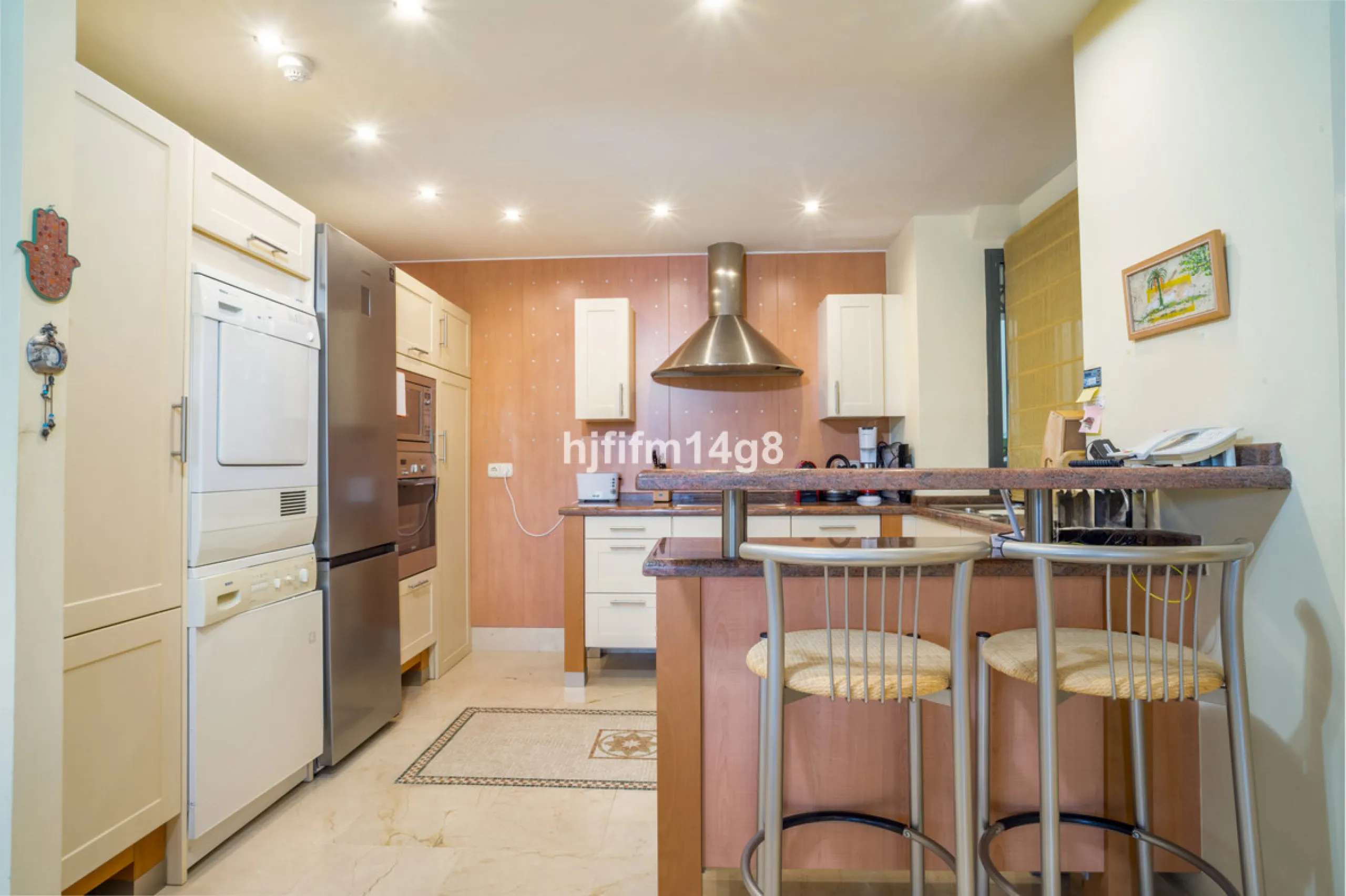 This elegant two-bedroom duplex penthouse for sale in Lorcrigolf offers a unique opportunity to enjoy refined living in one of Nueva Andalucía's most sought-after residential areas. Originally designed as a three-bedroom property, it can easily be reconve