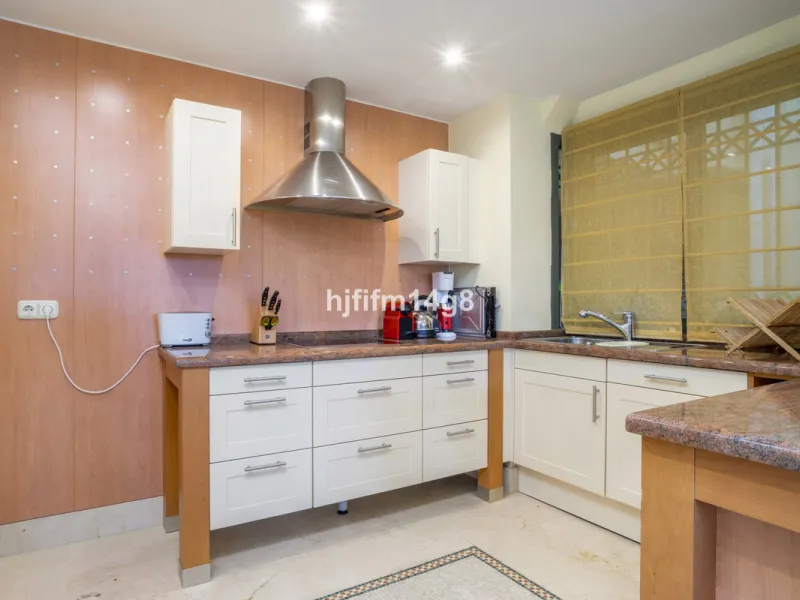 This elegant two-bedroom duplex penthouse for sale in Lorcrigolf offers a unique opportunity to enjoy refined living in one of Nueva Andalucía's most sought-after residential areas. Originally designed as a three-bedroom property, it can easily be reconve