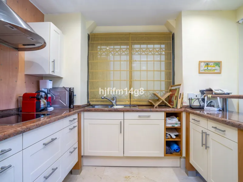 This elegant two-bedroom duplex penthouse for sale in Lorcrigolf offers a unique opportunity to enjoy refined living in one of Nueva Andalucía's most sought-after residential areas. Originally designed as a three-bedroom property, it can easily be reconve