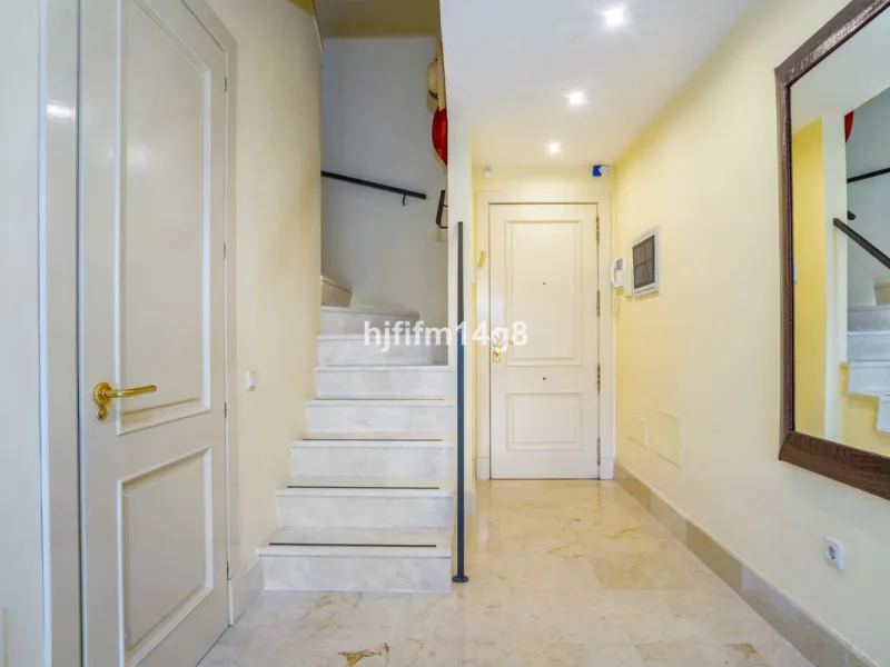 This elegant two-bedroom duplex penthouse for sale in Lorcrigolf offers a unique opportunity to enjoy refined living in one of Nueva Andalucía's most sought-after residential areas. Originally designed as a three-bedroom property, it can easily be reconve