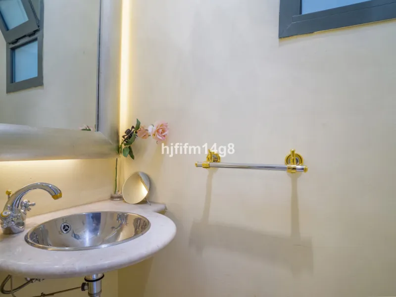 This elegant two-bedroom duplex penthouse for sale in Lorcrigolf offers a unique opportunity to enjoy refined living in one of Nueva Andalucía's most sought-after residential areas. Originally designed as a three-bedroom property, it can easily be reconve