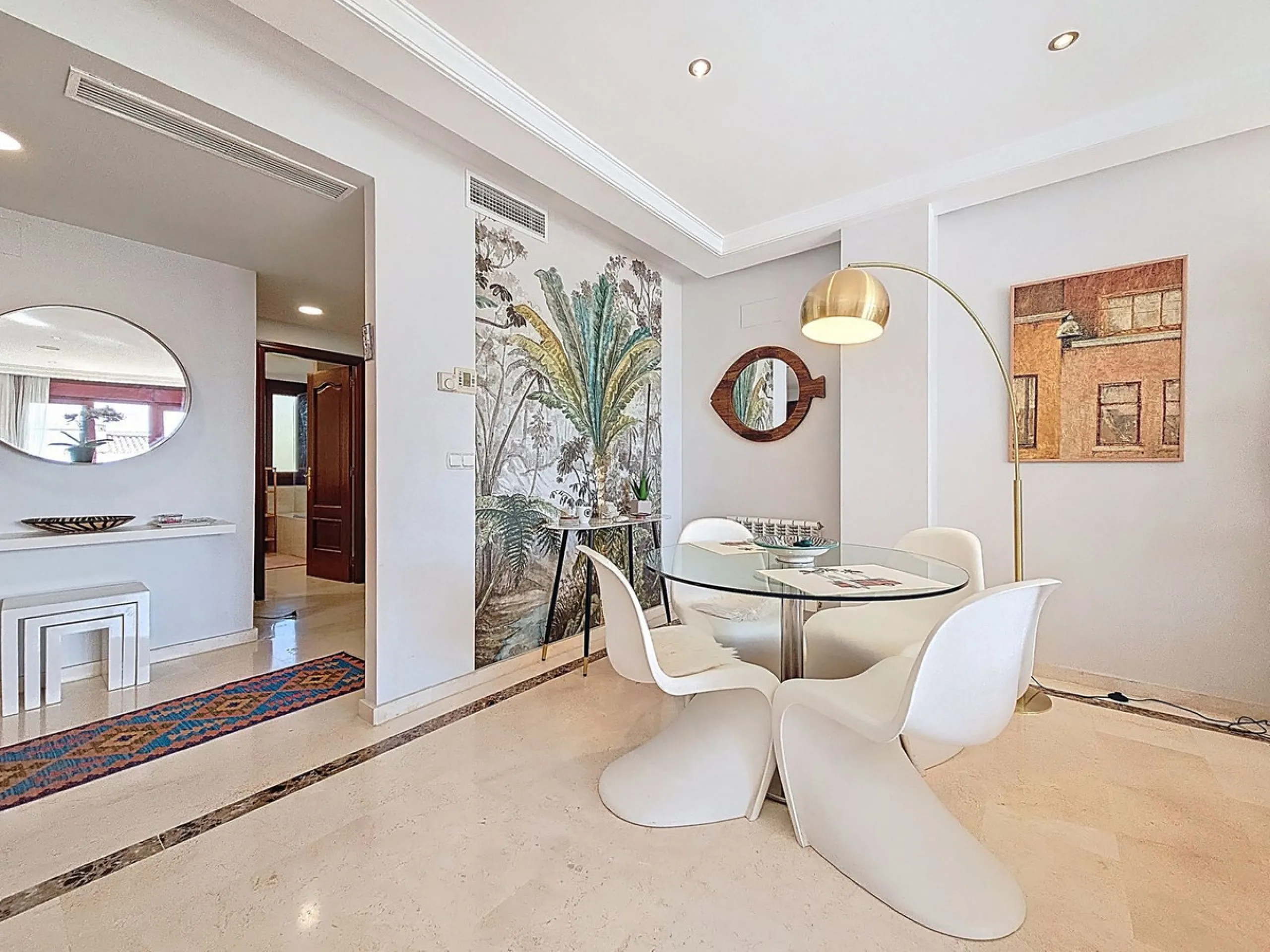 Welcome to this well-maintained two-bedroom, two-bathroom apartment set within the quiet and secure Casares Golf & Country Club, just minutes from the beach and the renowned Finca Cortesín resort.
