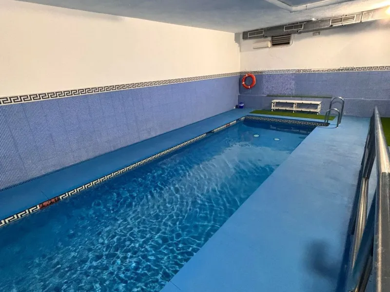 Bright Apartment with Terrace, Heated Pool and Garage in a Private Residential Complex