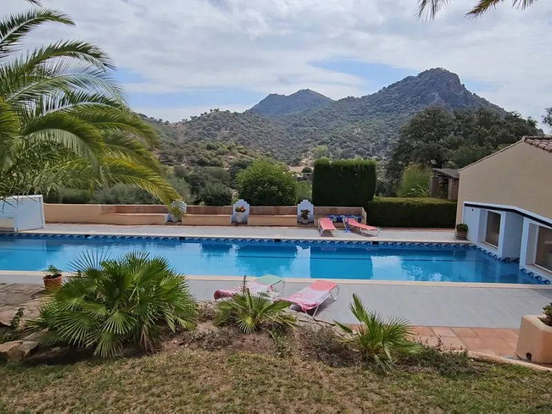 Amidst the captivating landscapes of Andalusia, Southern Spain, this charming country villa draws inspiration from traditional Andalusian architecture. Situated near the picturesque village of Gaucin, this exceptional property offers a unique blend of tra