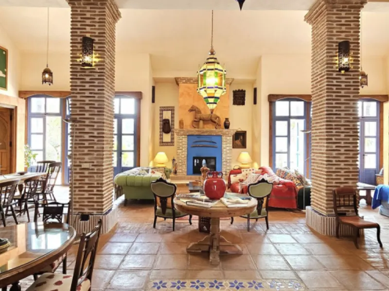Amidst the captivating landscapes of Andalusia, Southern Spain, this charming country villa draws inspiration from traditional Andalusian architecture. Situated near the picturesque village of Gaucin, this exceptional property offers a unique blend of tra