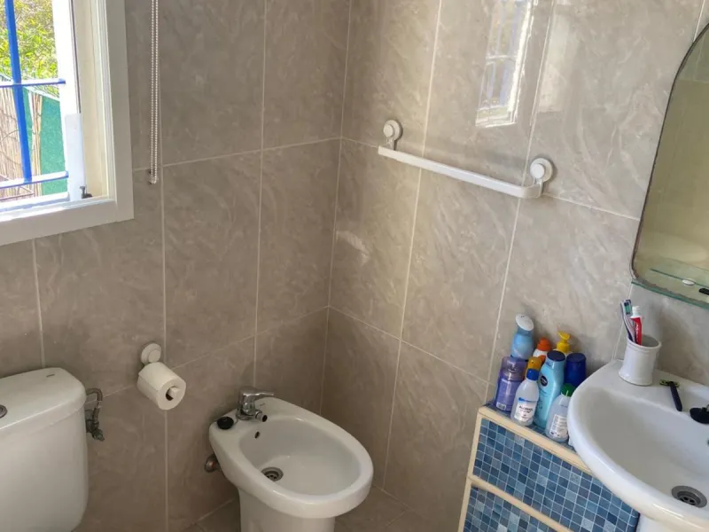 Charming ground floor corner apartment with private garden and direct access to nature and the beach, located just a four-minute walk from El Charcón Beach. This property stands out for its privacy, outdoor space and the relaxed coastal lifestyle it offer