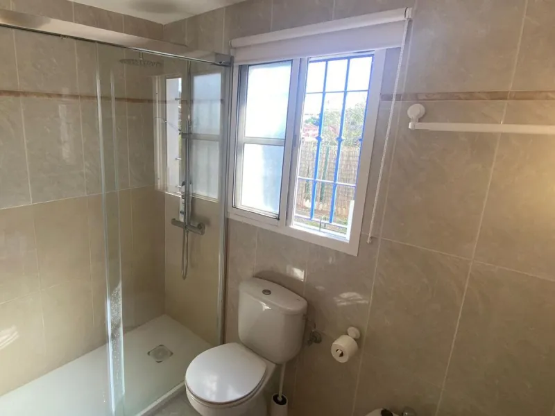 Charming ground floor corner apartment with private garden and direct access to nature and the beach, located just a four-minute walk from El Charcón Beach. This property stands out for its privacy, outdoor space and the relaxed coastal lifestyle it offer
