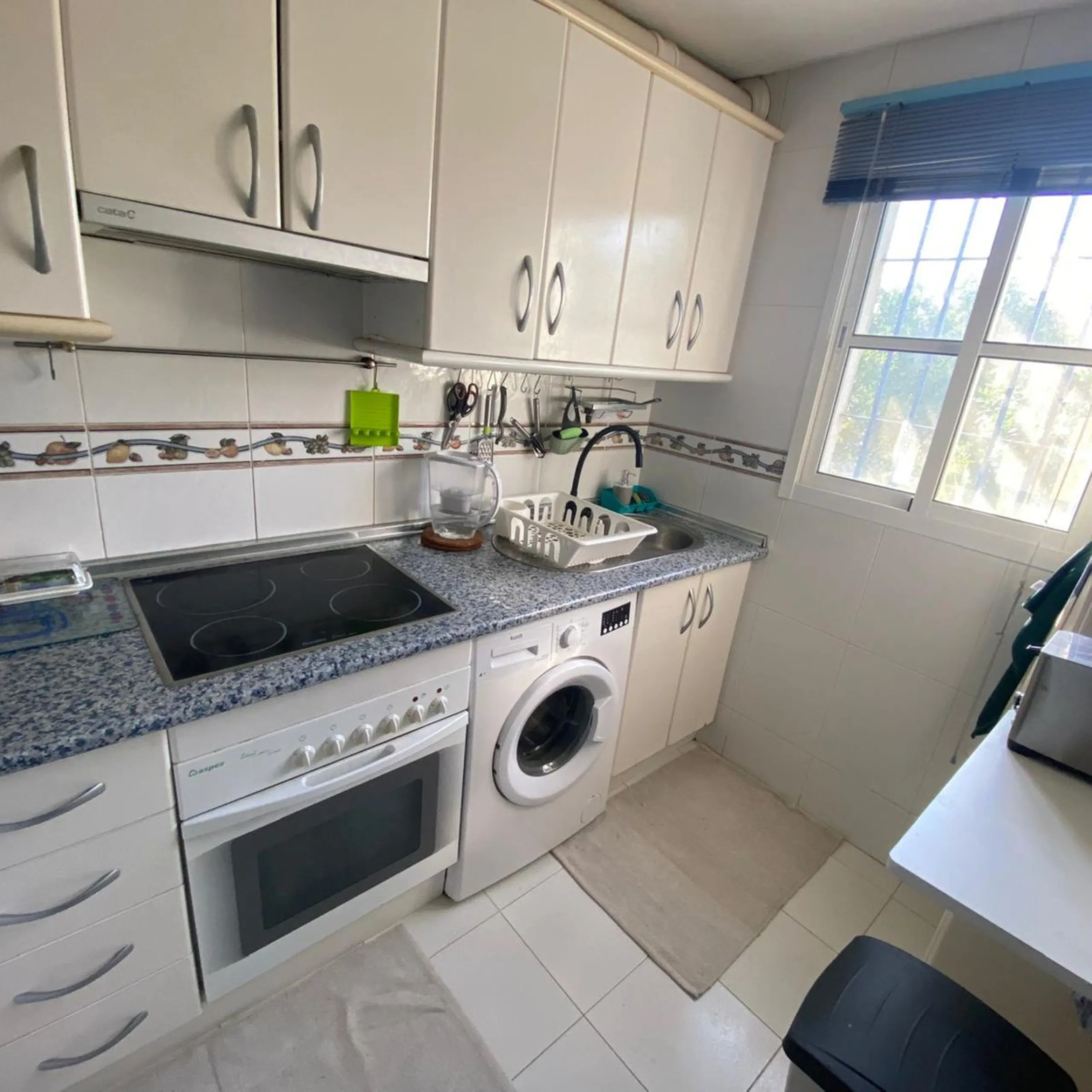 Charming ground floor corner apartment with private garden and direct access to nature and the beach, located just a four-minute walk from El Charcón Beach. This property stands out for its privacy, outdoor space and the relaxed coastal lifestyle it offer