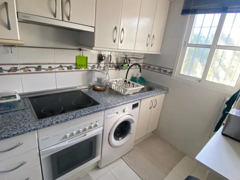 Charming ground floor corner apartment with private garden and direct access to nature and the beach, located just a four-minute walk from El Charcón Beach. This property stands out for its privacy, outdoor space and the relaxed coastal lifestyle it offer