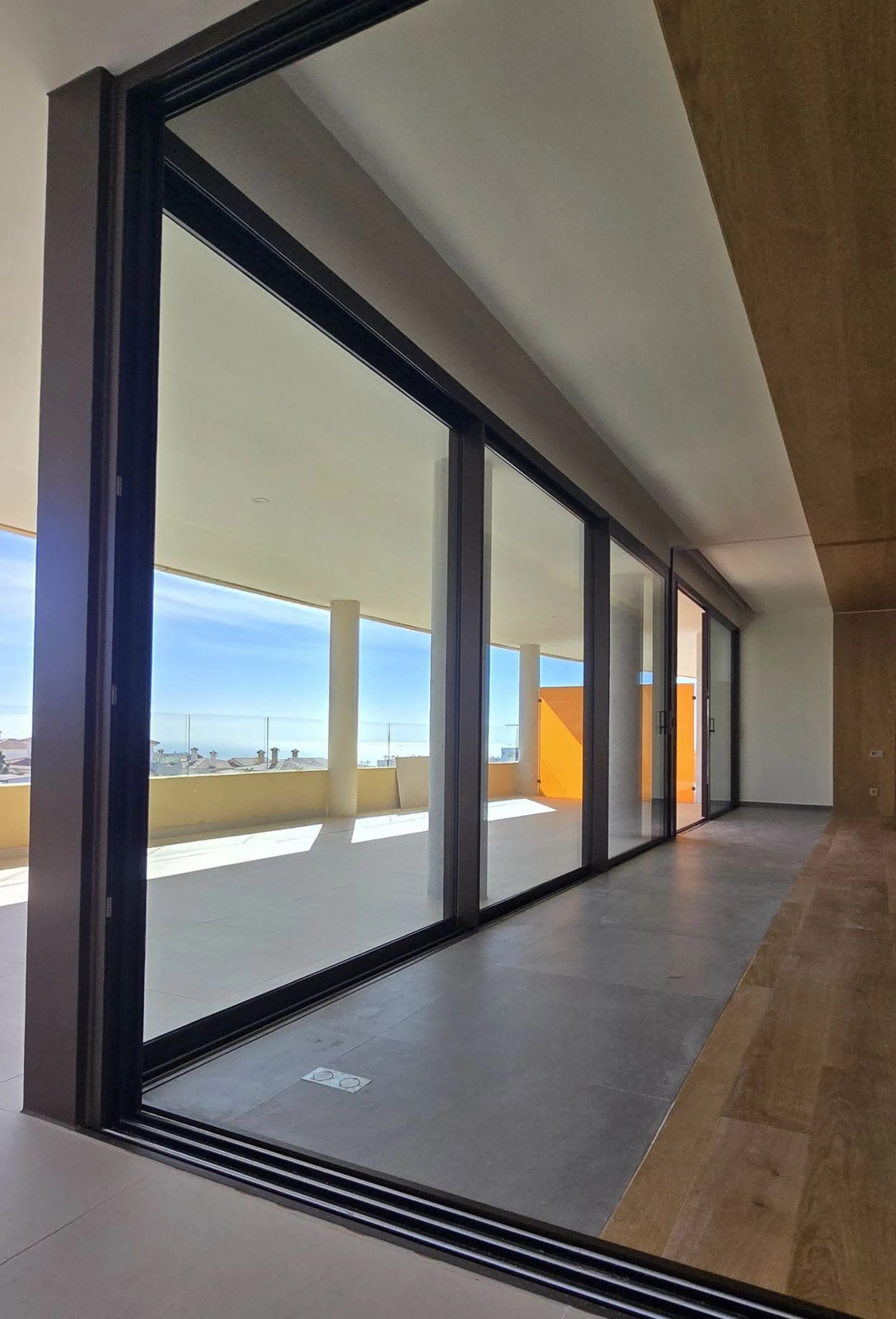 Exclusive Luxury middle floor Apartment with generous covered corner terrace.