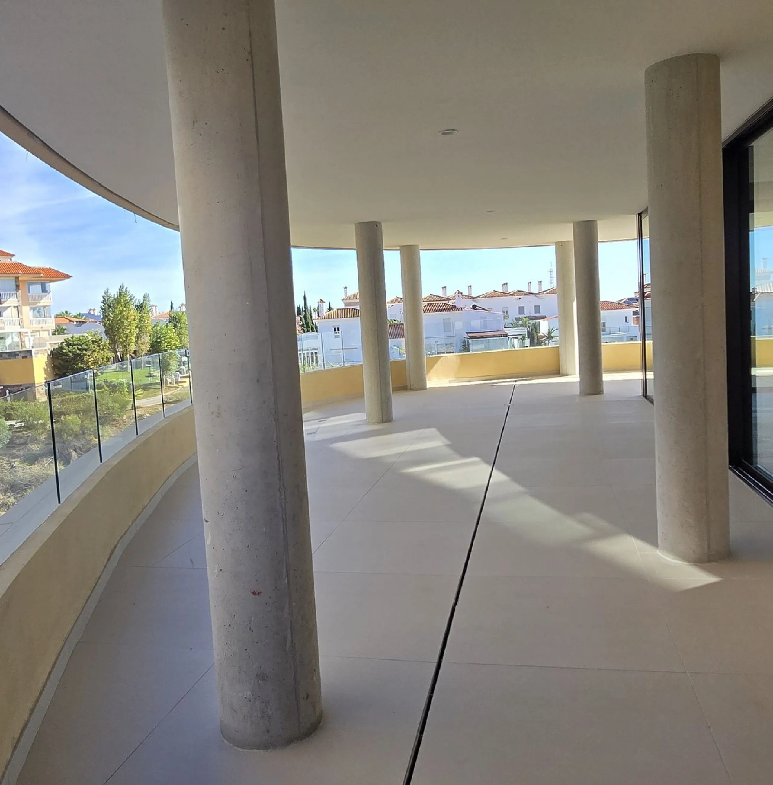 Exclusive Luxury middle floor Apartment with generous covered corner terrace.