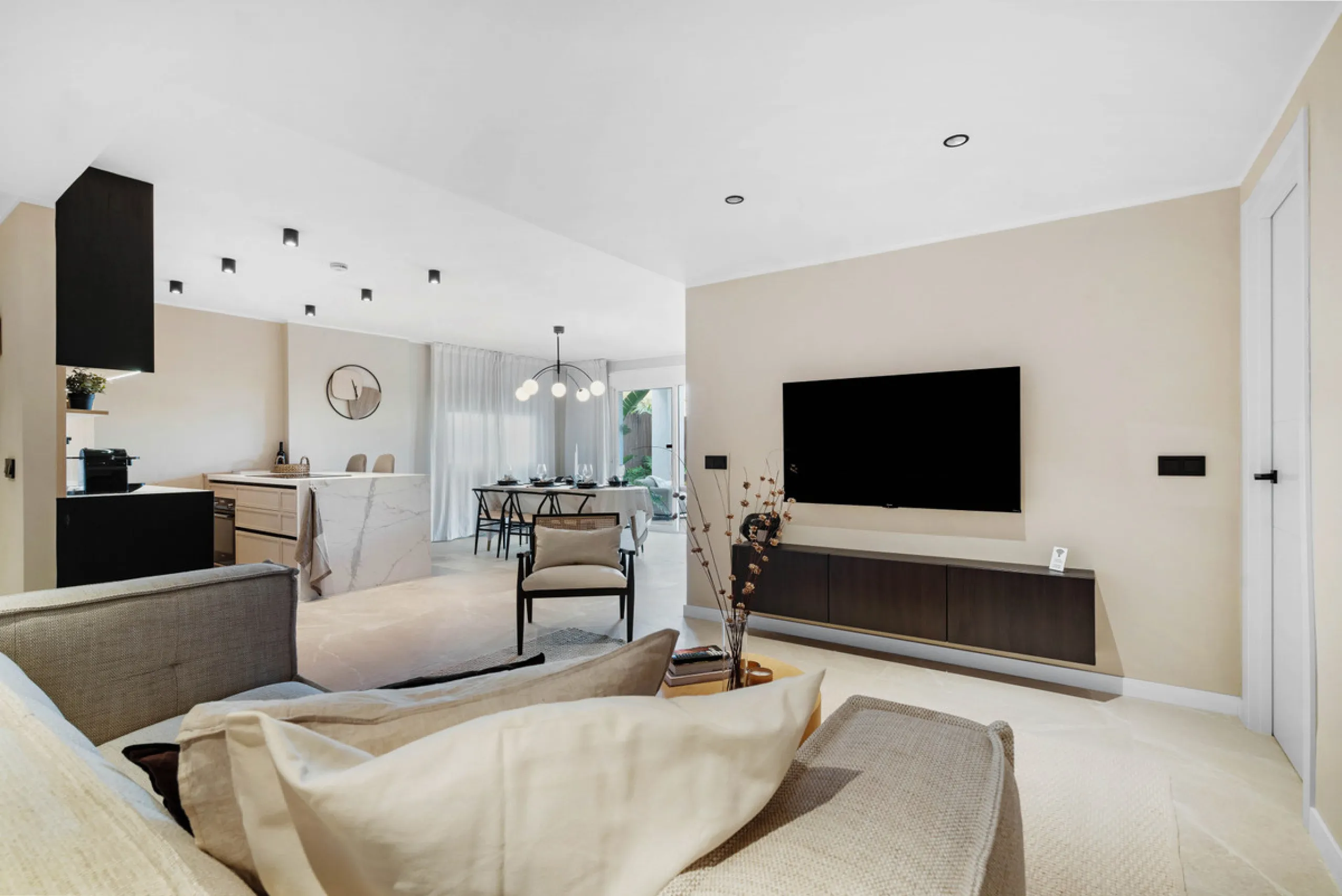 Discover this beautifully designed 4-bedroom, 2-bathroom apartment inspired by timeless Scandinavian aesthetics, blending modern sophistication with natural touches for a serene and stylish living experience. Ideally located in a gated community with priv