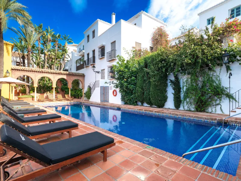 This bright and inviting 3-bedroom townhouse effortlessly combines the charm of traditional Andalusian design with updated modern aesthetics. Ideally located near all amenities and just moments from the renowned Puente Romano, Golden Mile, Marbella, this 
