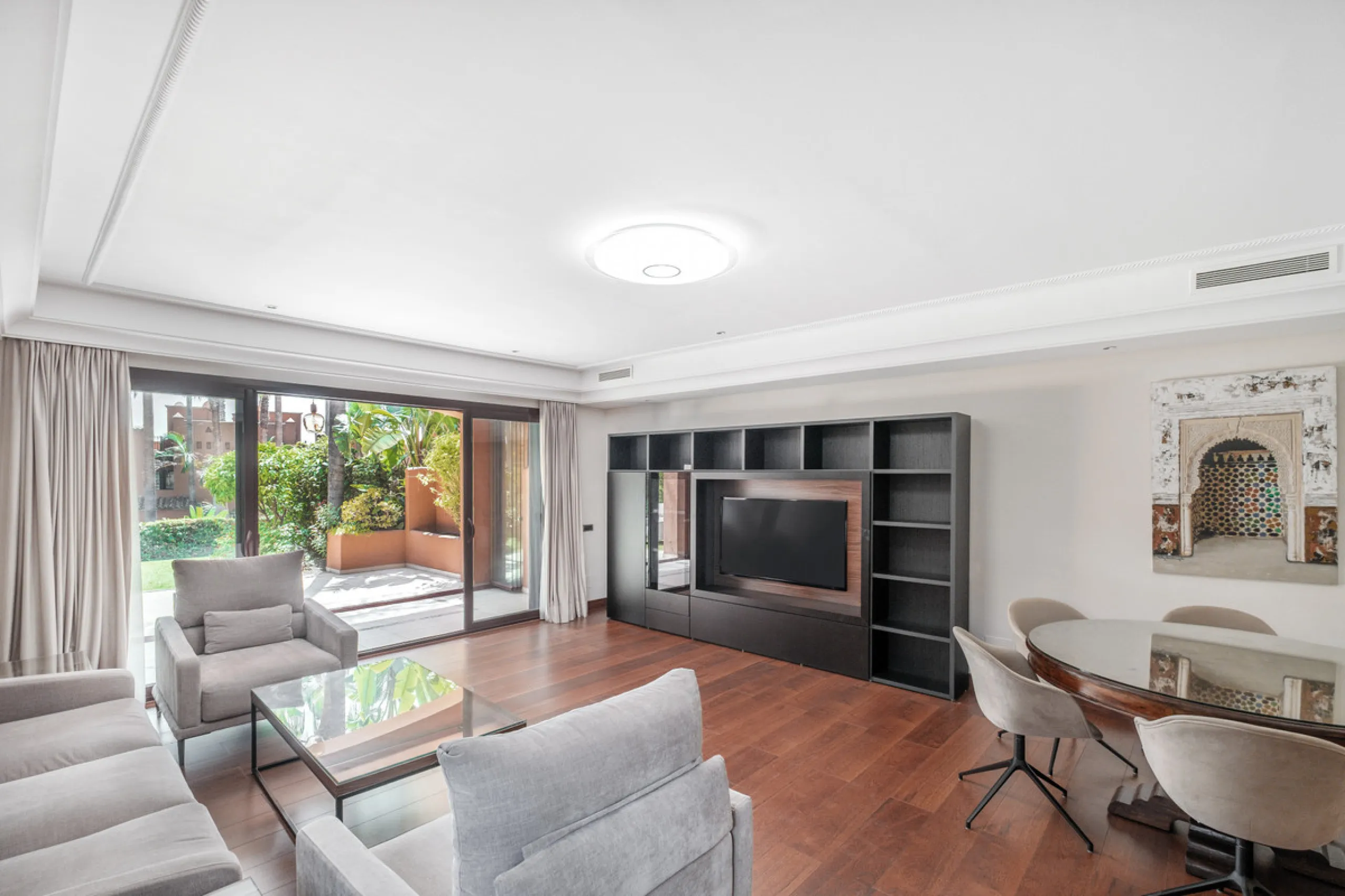 Just a short walk from Puente Romano and the beach, this fully renovated corner-unit villa is located in the exclusive gated community of Monte Marbella Club, with only 17 homes.