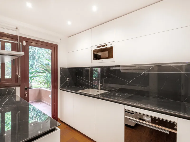 Just a short walk from Puente Romano and the beach, this fully renovated corner-unit villa is located in the exclusive gated community of Monte Marbella Club, with only 17 homes.