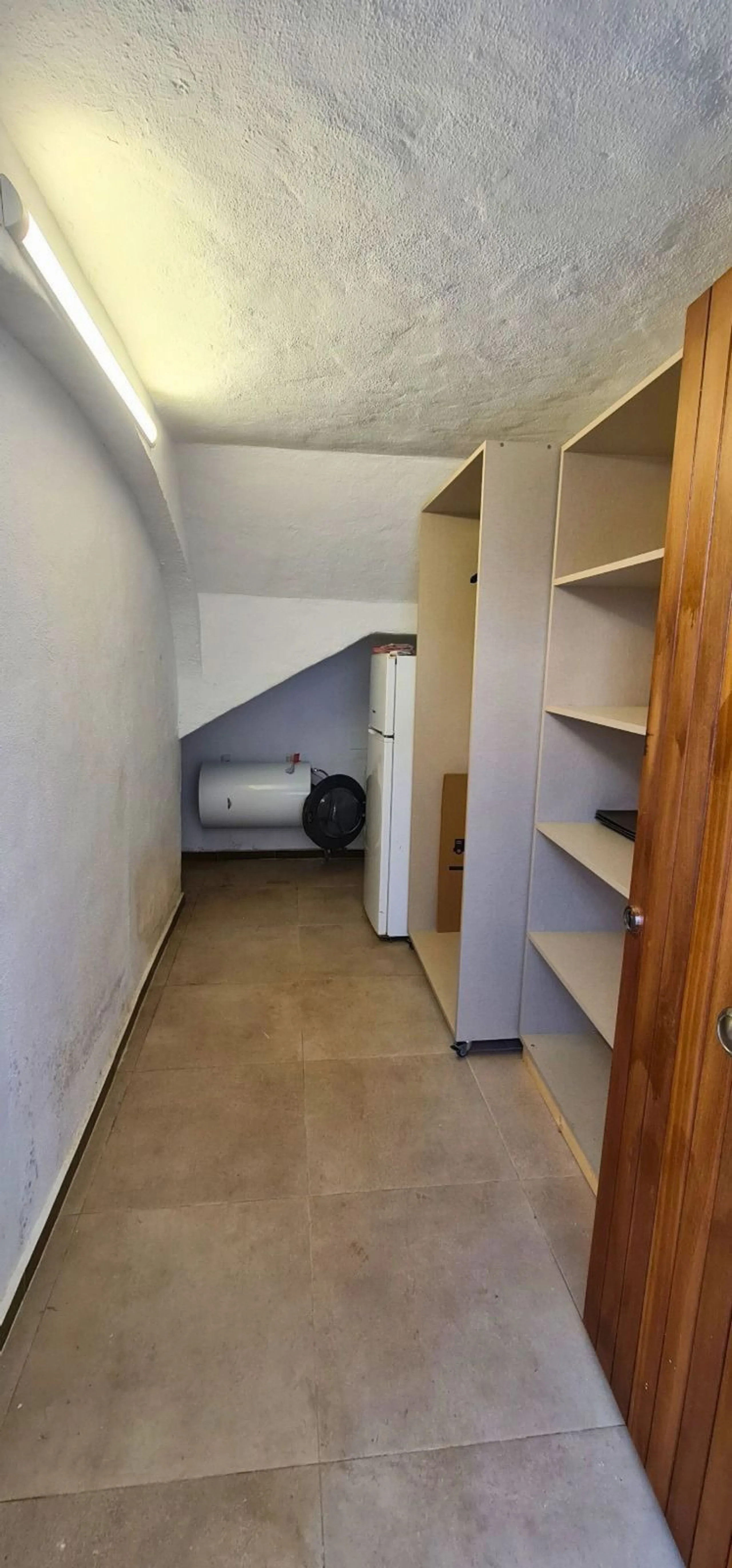 For sale is a charming, fully renovated townhouse in 2024, located in a quiet Andalusian-style village development in Marbella. This property, perfect for a small family, vacation rental, or long-term lease, features a living room with sea and garden view