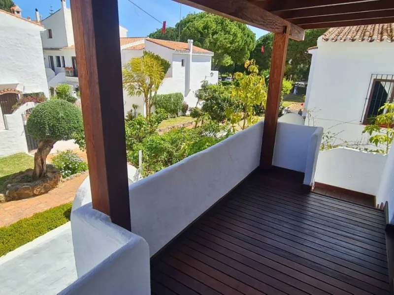 For sale is a charming, fully renovated townhouse in 2024, located in a quiet Andalusian-style village development in Marbella. This property, perfect for a small family, vacation rental, or long-term lease, features a living room with sea and garden view