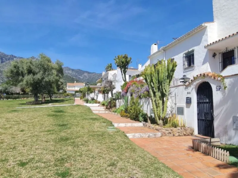 For sale is a charming, fully renovated townhouse in 2024, located in a quiet Andalusian-style village development in Marbella. This property, perfect for a small family, vacation rental, or long-term lease, features a living room with sea and garden view