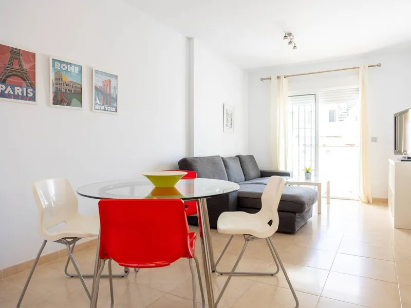 Turnkey 2-bed/1-bath apartment in the Chimeneas area of Nerja. Bright living-dining room, fully fitted kitchen and a separate laundry room. Sold fully furnished. Community pool.