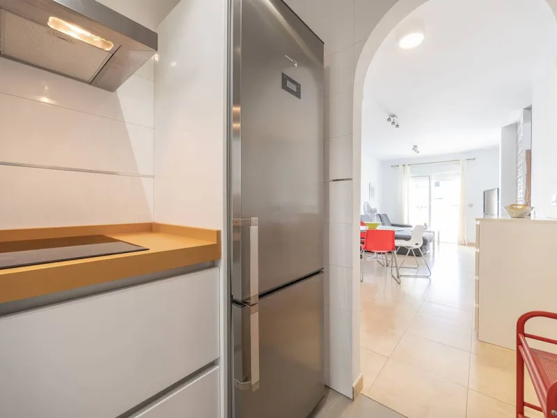 Turnkey 2-bed/1-bath apartment in the Chimeneas area of Nerja. Bright living-dining room, fully fitted kitchen and a separate laundry room. Sold fully furnished. Community pool.