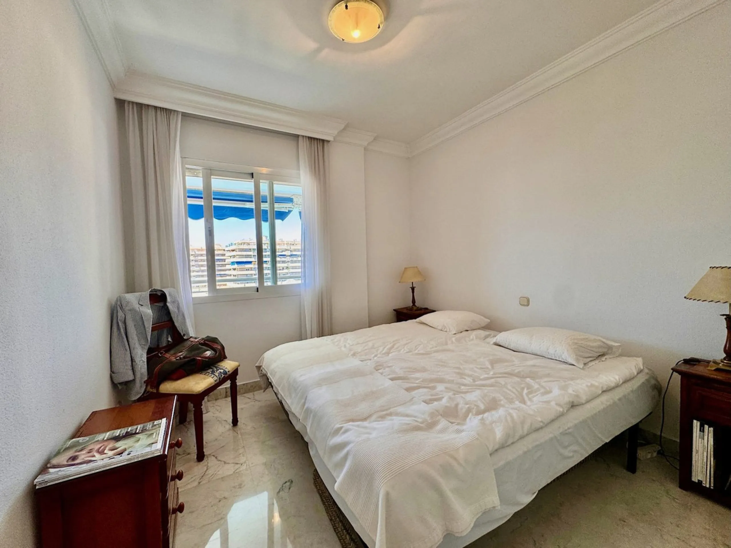 Location, Location, Location this apartment is located in the Prestigious Marina Banus building under two minutes walk from the Port of Puerto Banus and also the beach. This bright two bedroom and two bathroom apartment is located in an elevated position 