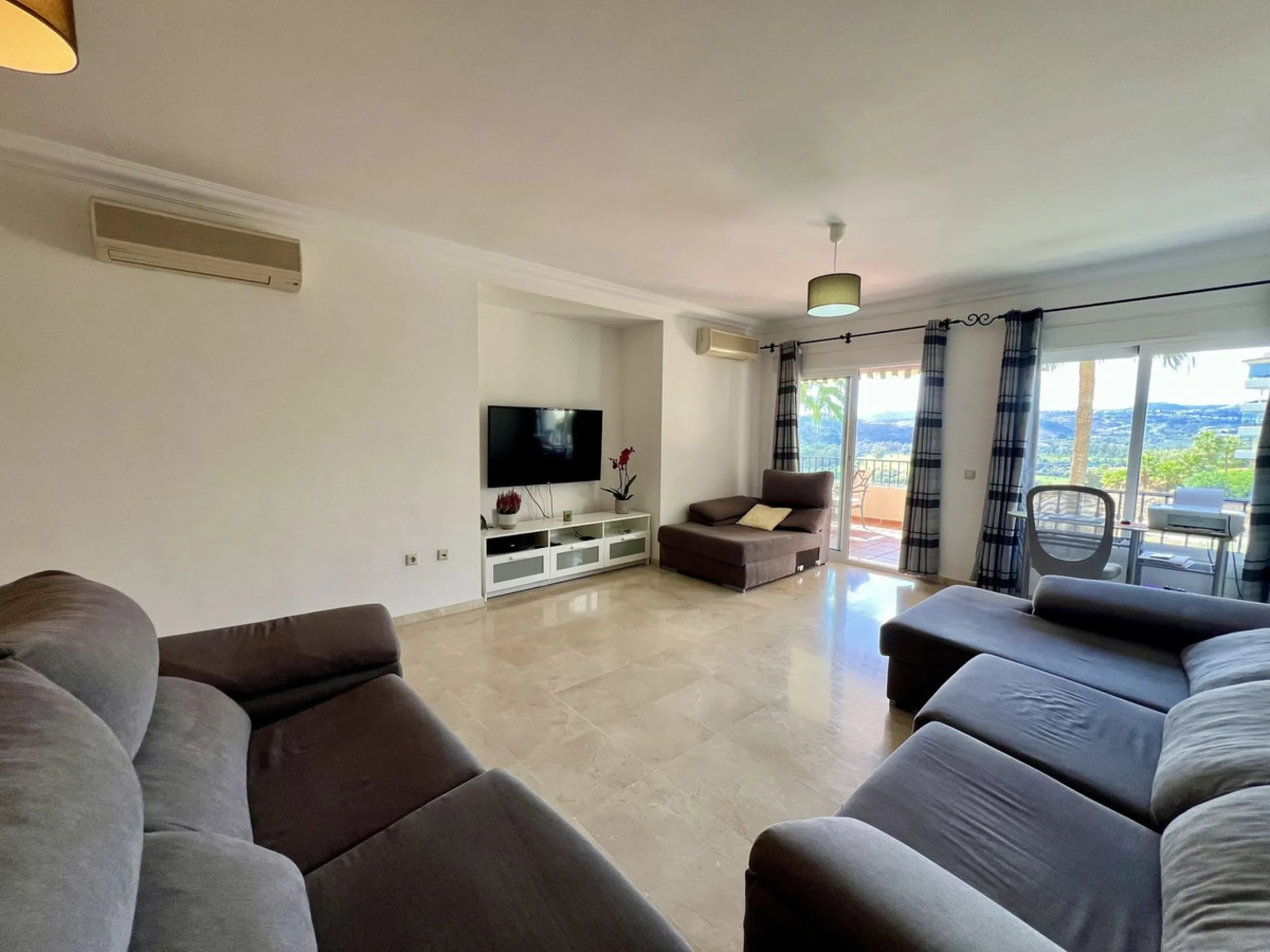 Located in Phase 1, this spacious two-bedroom apartment offers comfortable living in a peaceful and well-maintained setting.