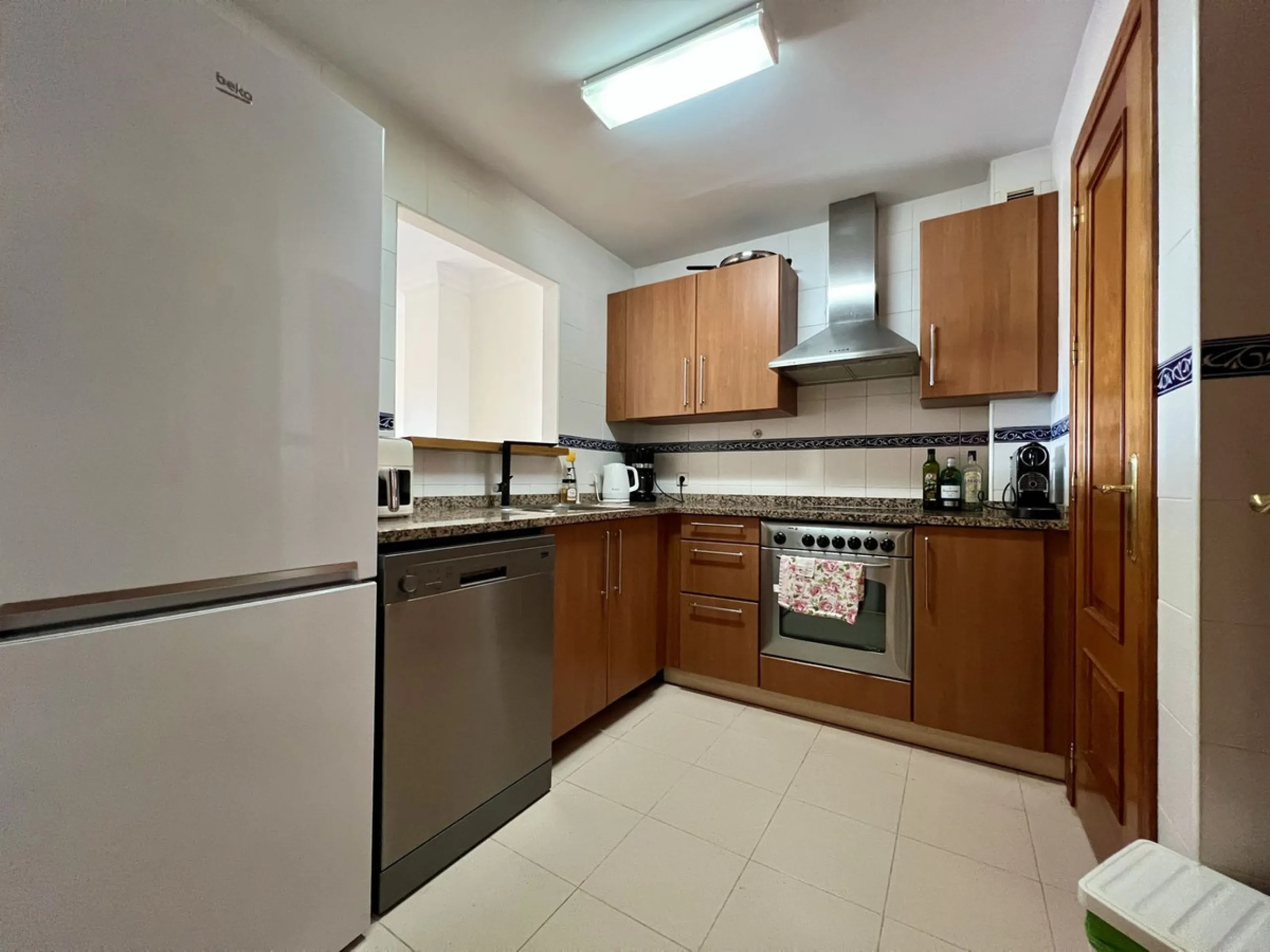 Located in Phase 1, this spacious two-bedroom apartment offers comfortable living in a peaceful and well-maintained setting.