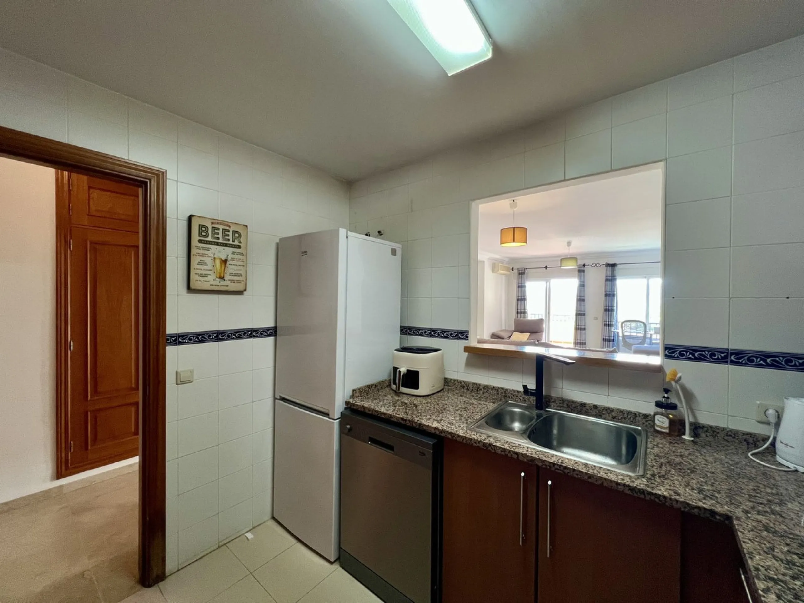 Located in Phase 1, this spacious two-bedroom apartment offers comfortable living in a peaceful and well-maintained setting.