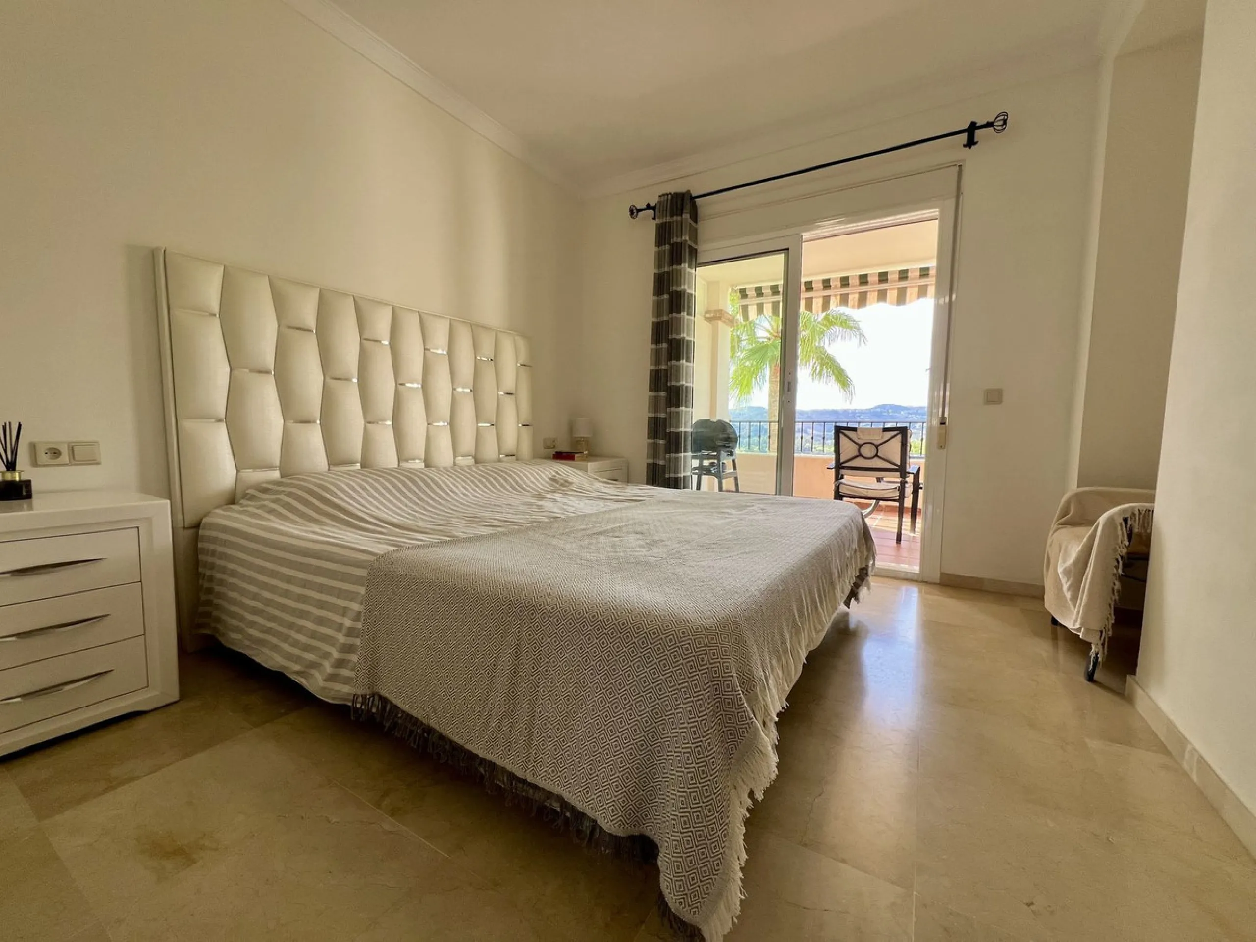 Located in Phase 1, this spacious two-bedroom apartment offers comfortable living in a peaceful and well-maintained setting.