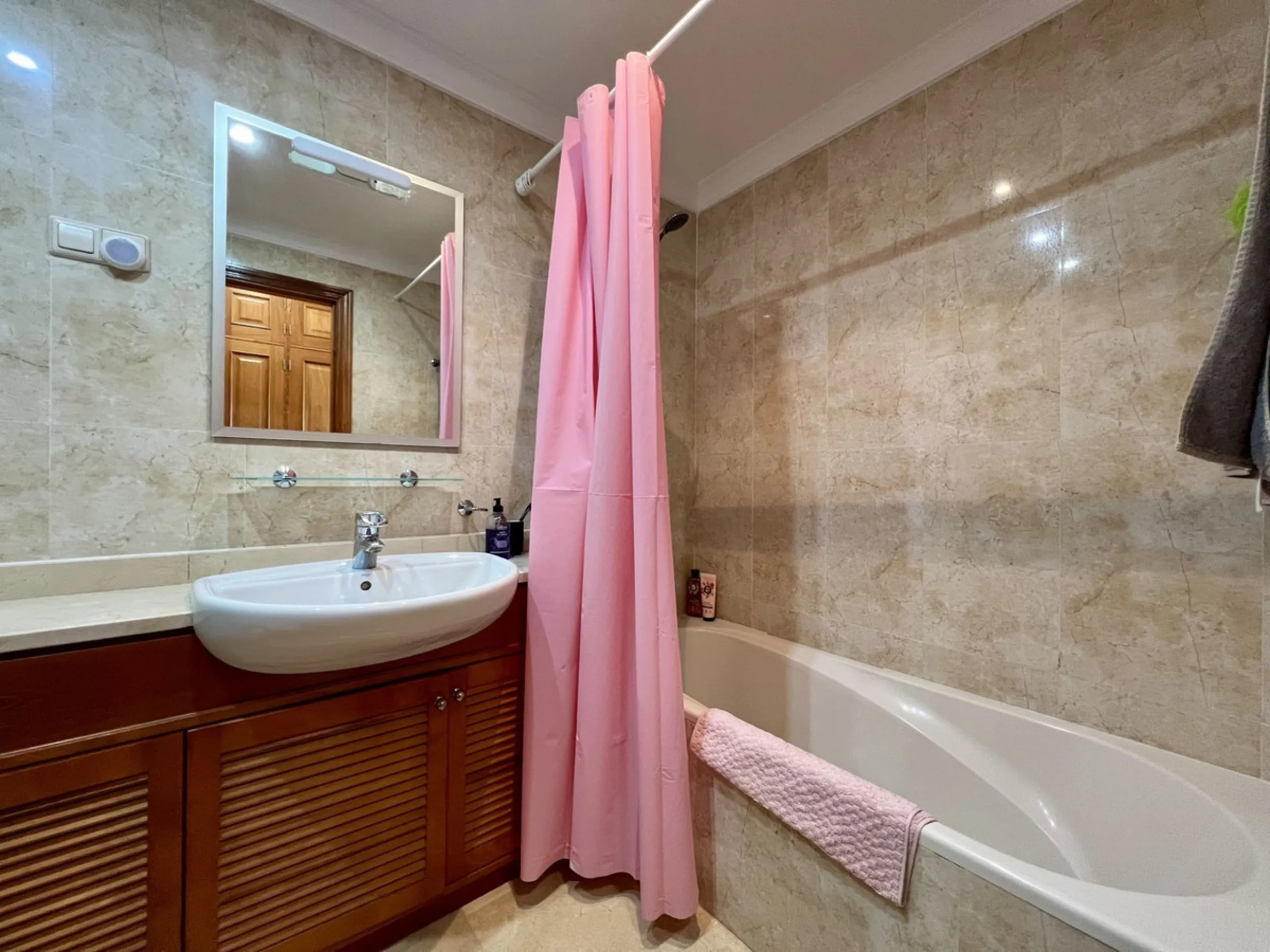 Located in Phase 1, this spacious two-bedroom apartment offers comfortable living in a peaceful and well-maintained setting.