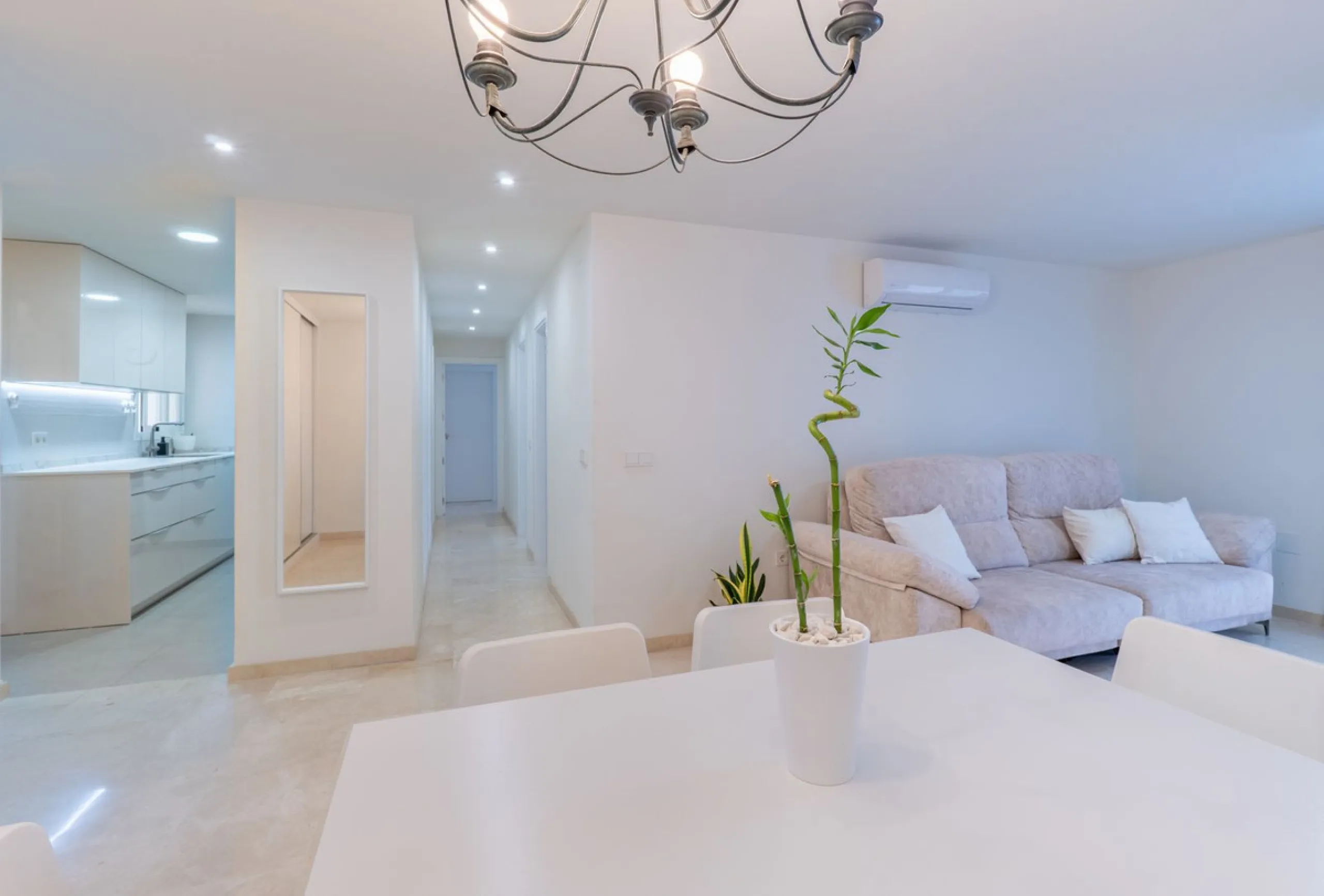 This modern and spacious apartment has been fully renovated, offering a fresh and functional design ideal for year-round living or as a smart investment opportunity. The property features a bright and generous living-dining area with direct access to a pr
