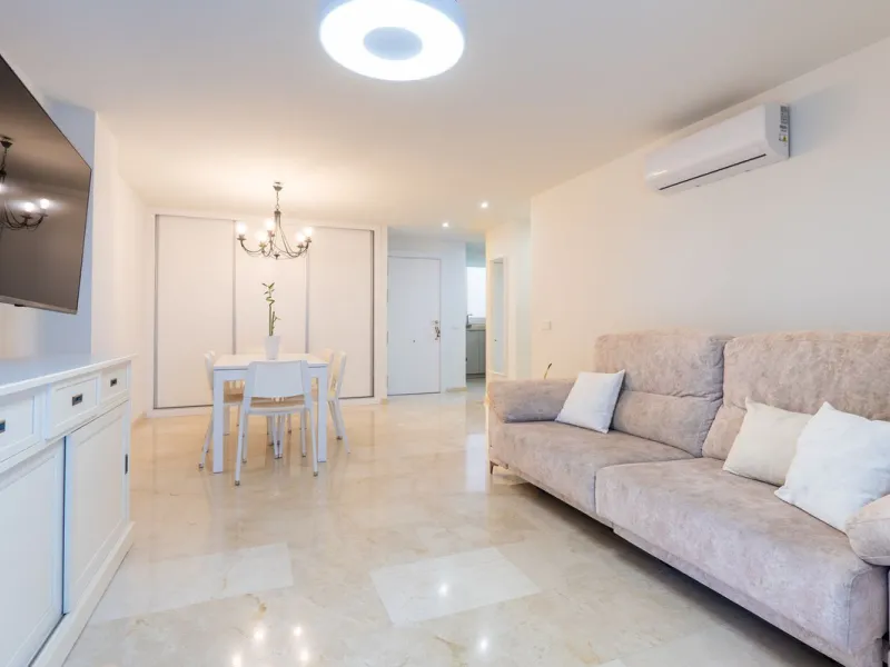 This modern and spacious apartment has been fully renovated, offering a fresh and functional design ideal for year-round living or as a smart investment opportunity. The property features a bright and generous living-dining area with direct access to a pr