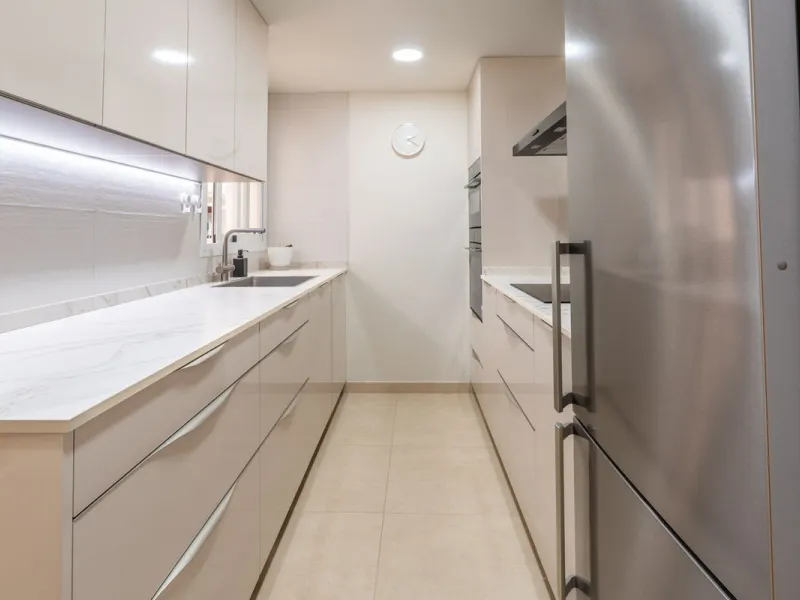 This modern and spacious apartment has been fully renovated, offering a fresh and functional design ideal for year-round living or as a smart investment opportunity. The property features a bright and generous living-dining area with direct access to a pr