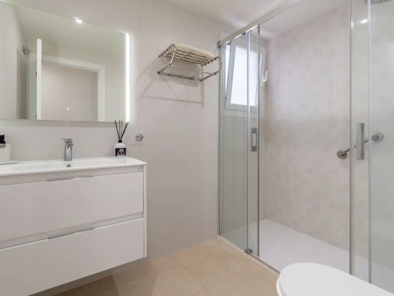This modern and spacious apartment has been fully renovated, offering a fresh and functional design ideal for year-round living or as a smart investment opportunity. The property features a bright and generous living-dining area with direct access to a pr