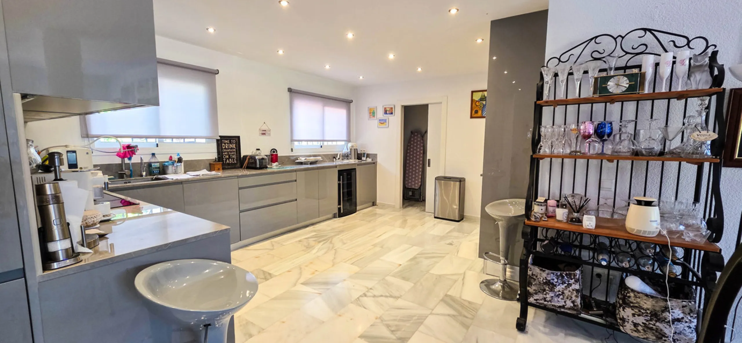 Set on the front line of La Duquesa's golf course, this south-facing semi-detached bungalow combines space, sustainability, and location in one irresistible package. Offering five bedrooms, all with ensuite bathrooms, this is a home designed for comfortab