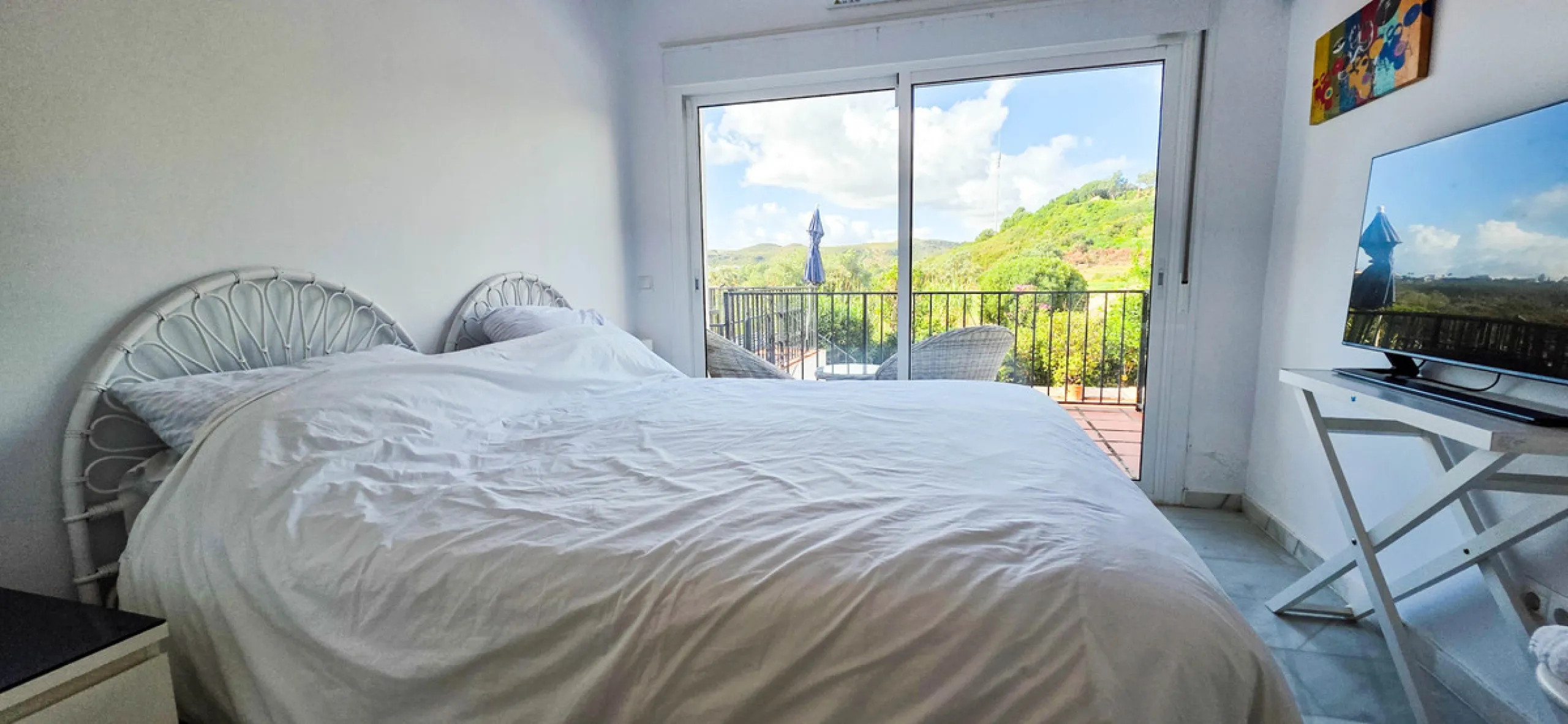 Set on the front line of La Duquesa's golf course, this south-facing semi-detached bungalow combines space, sustainability, and location in one irresistible package. Offering five bedrooms, all with ensuite bathrooms, this is a home designed for comfortab