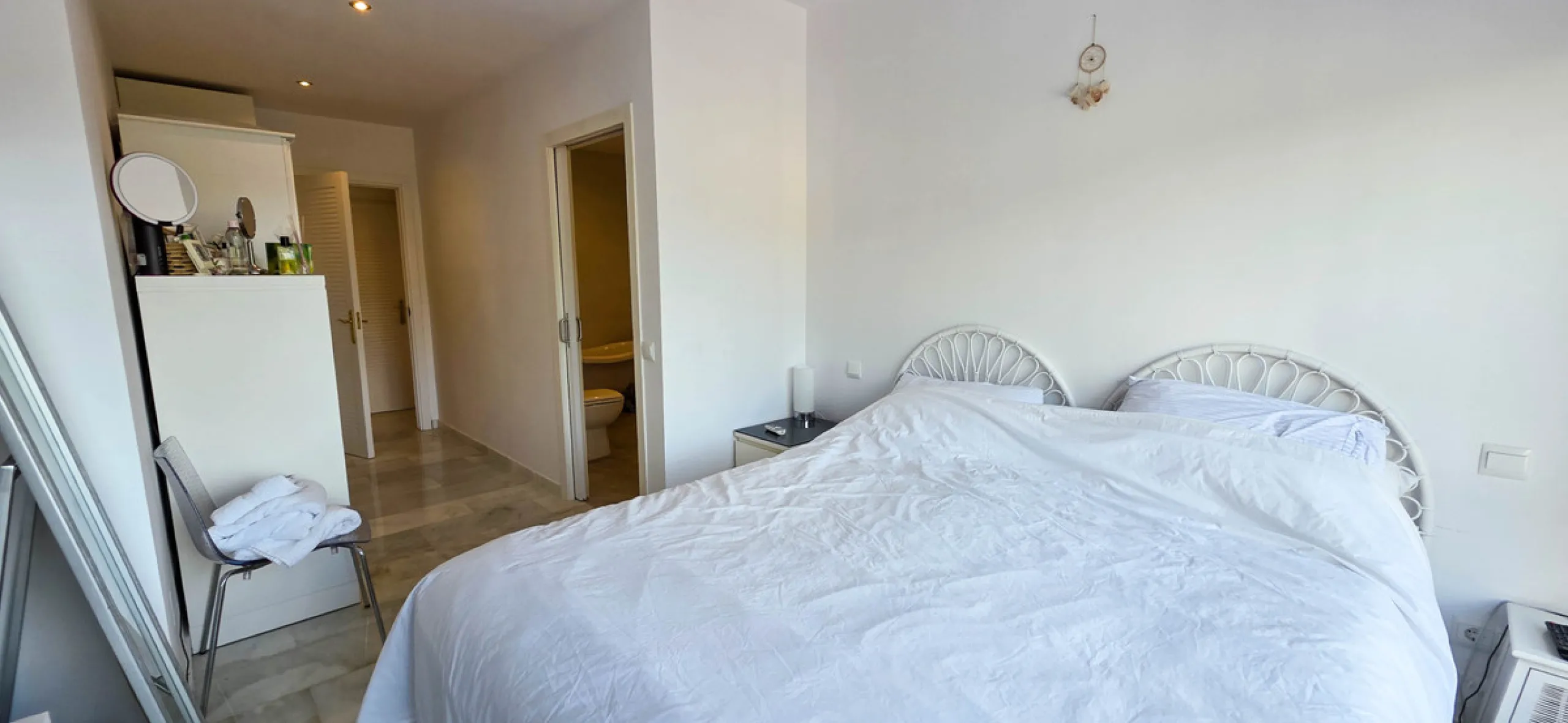 Set on the front line of La Duquesa's golf course, this south-facing semi-detached bungalow combines space, sustainability, and location in one irresistible package. Offering five bedrooms, all with ensuite bathrooms, this is a home designed for comfortab