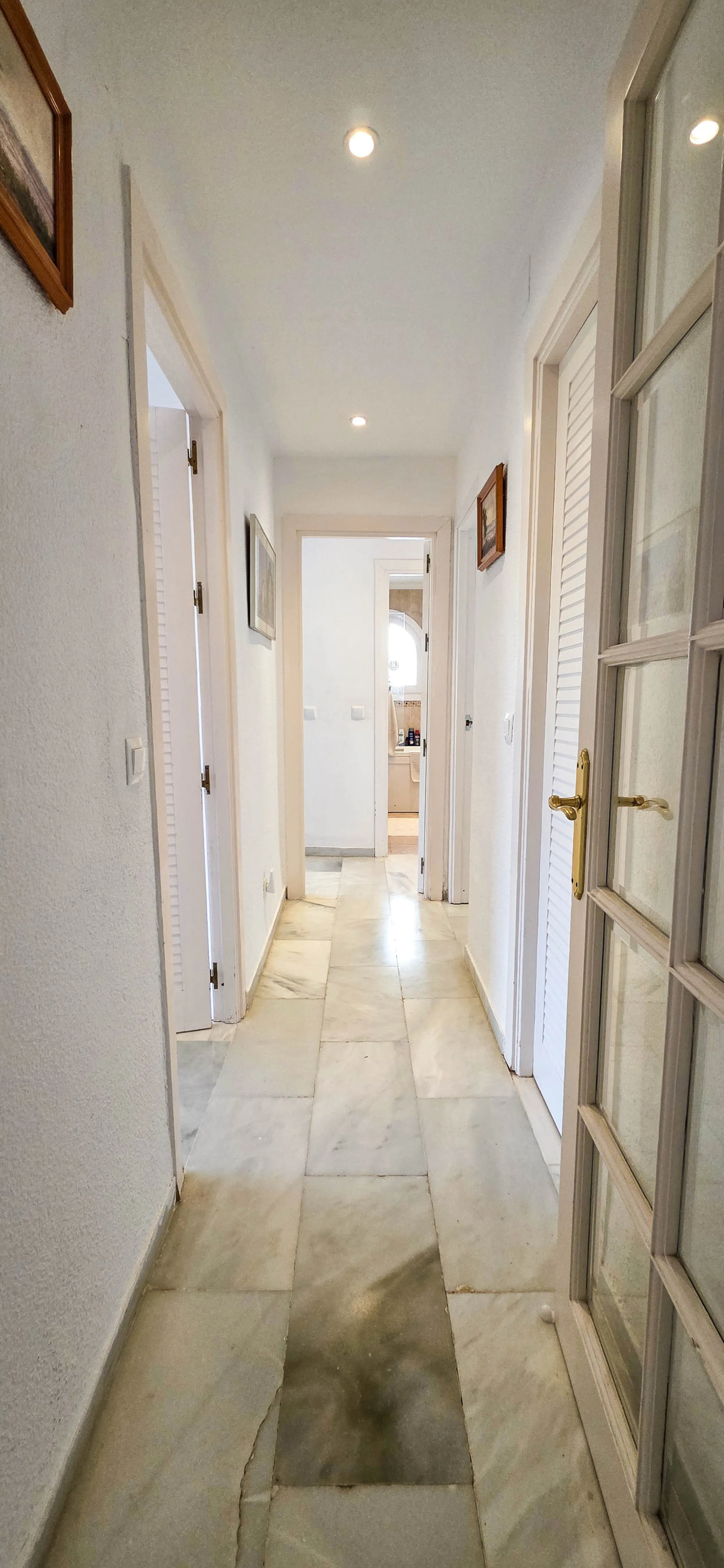 Set on the front line of La Duquesa's golf course, this south-facing semi-detached bungalow combines space, sustainability, and location in one irresistible package. Offering five bedrooms, all with ensuite bathrooms, this is a home designed for comfortab