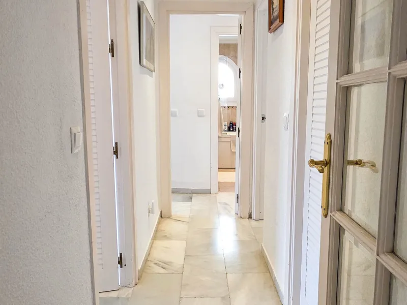Set on the front line of La Duquesa's golf course, this south-facing semi-detached bungalow combines space, sustainability, and location in one irresistible package. Offering five bedrooms, all with ensuite bathrooms, this is a home designed for comfortab