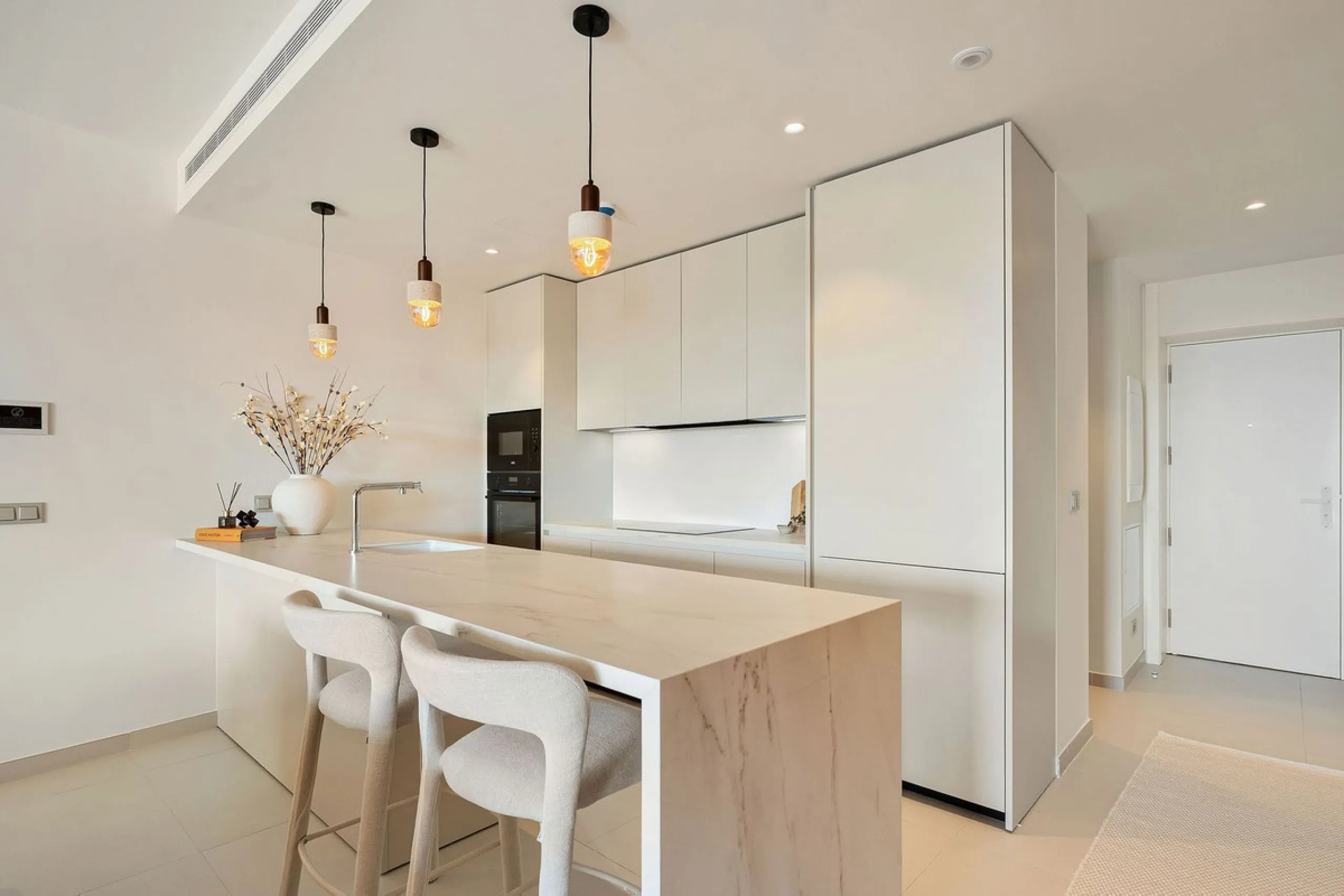 Experience refined coastal living in this brand-new luxury apartment set within the prestigious Higuerón Resort.