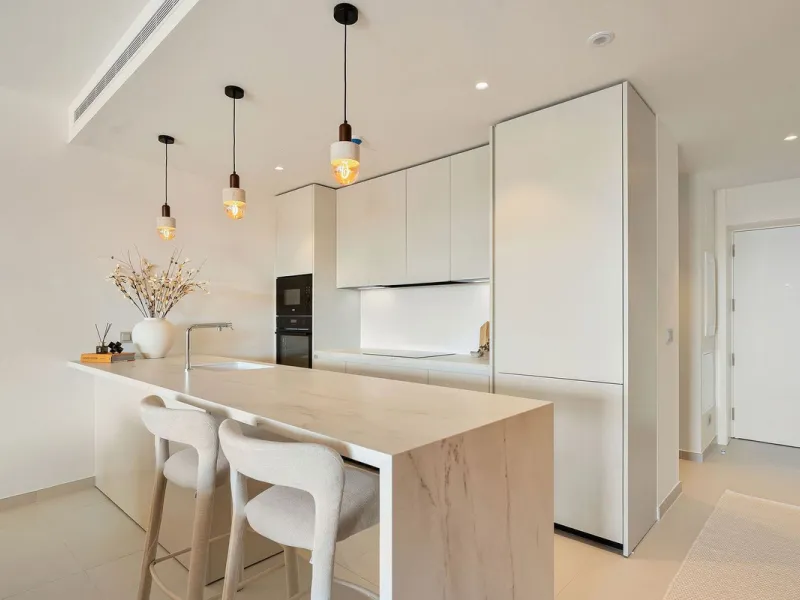 Experience refined coastal living in this brand-new luxury apartment set within the prestigious Higuerón Resort.