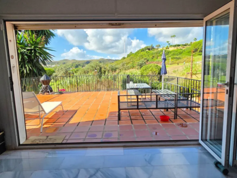 Set on the front line of La Duquesa's golf course, this south-facing semi-detached bungalow combines space, sustainability, and location in one irresistible package. Offering five bedrooms, all with ensuite bathrooms, this is a home designed for comfortab