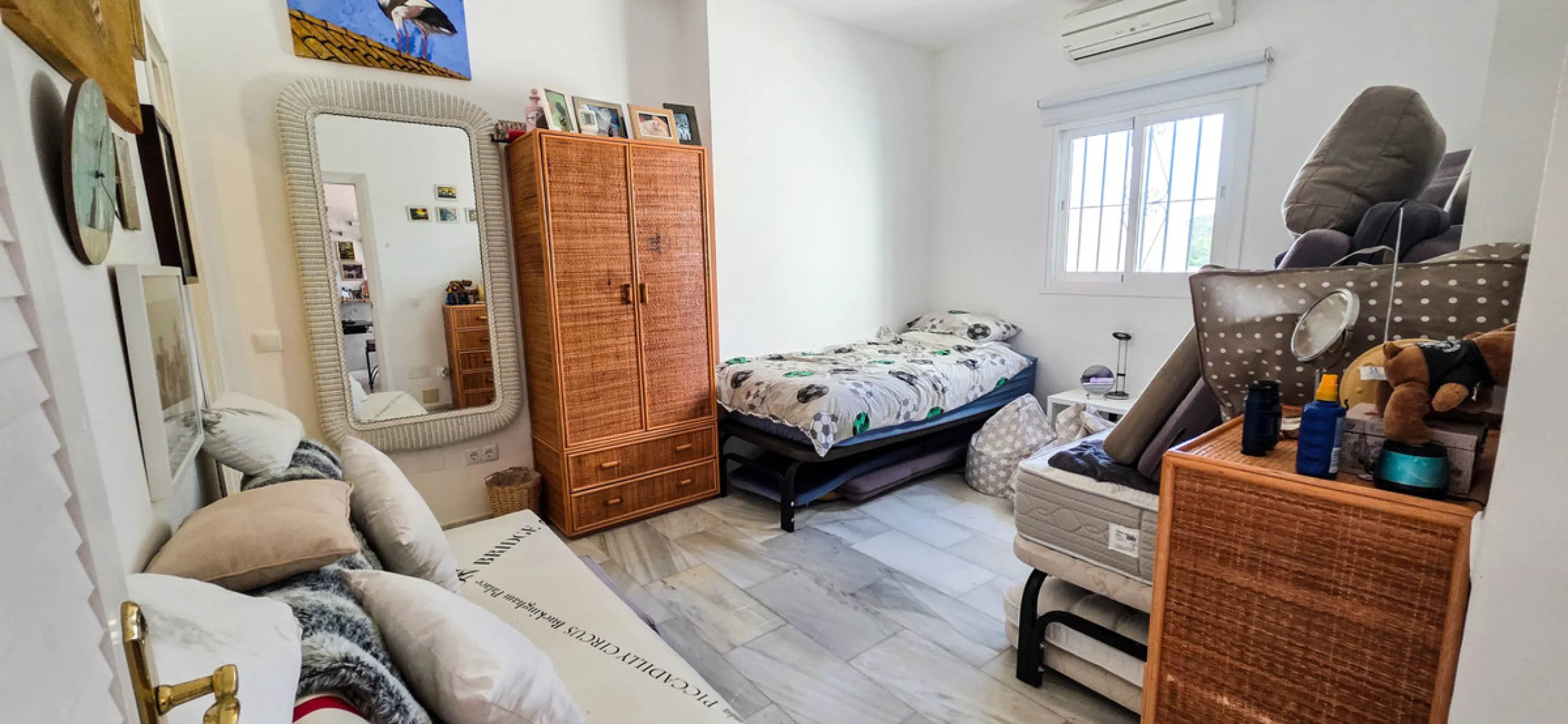 Set on the front line of La Duquesa's golf course, this south-facing semi-detached bungalow combines space, sustainability, and location in one irresistible package. Offering five bedrooms, all with ensuite bathrooms, this is a home designed for comfortab