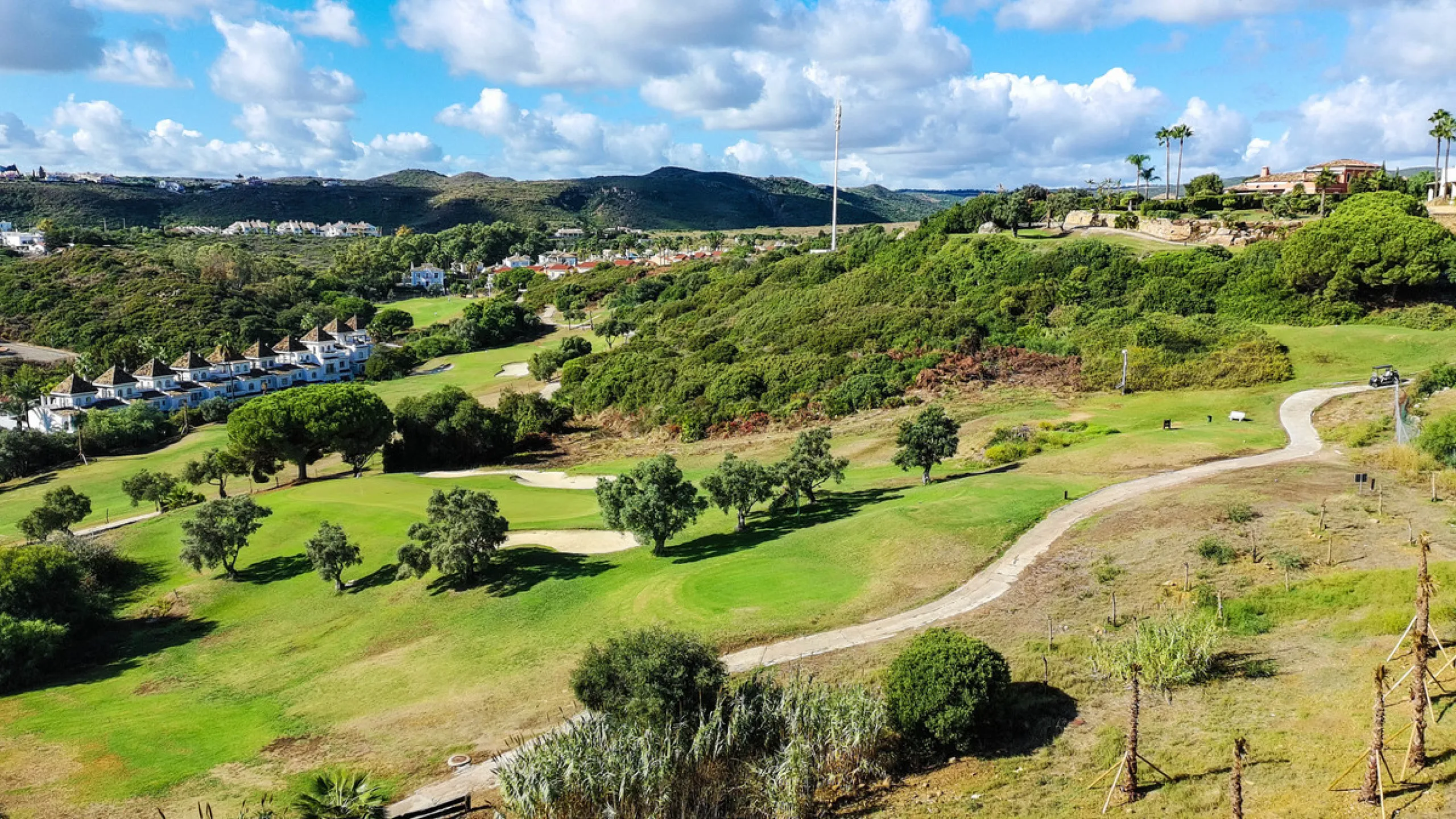 Set on the front line of La Duquesa's golf course, this south-facing semi-detached bungalow combines space, sustainability, and location in one irresistible package. Offering five bedrooms, all with ensuite bathrooms, this is a home designed for comfortab