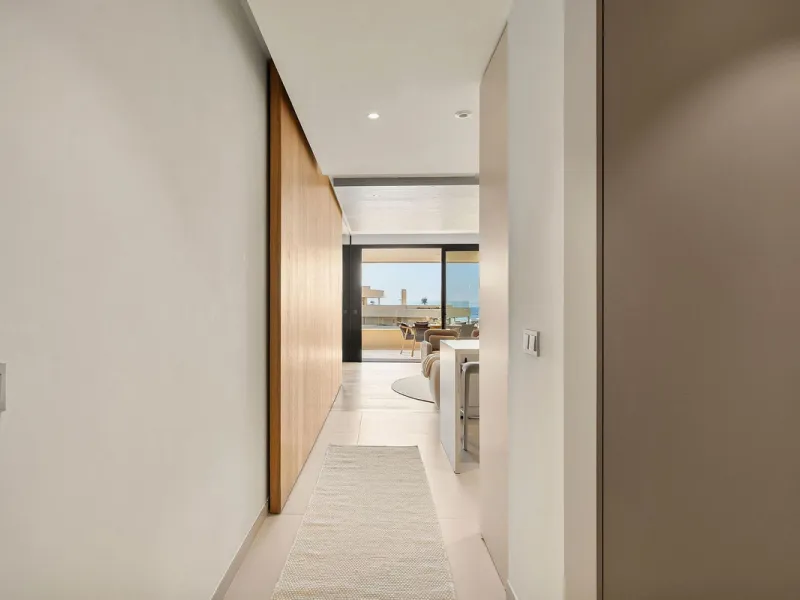 Experience refined coastal living in this brand-new luxury apartment set within the prestigious Higuerón Resort.