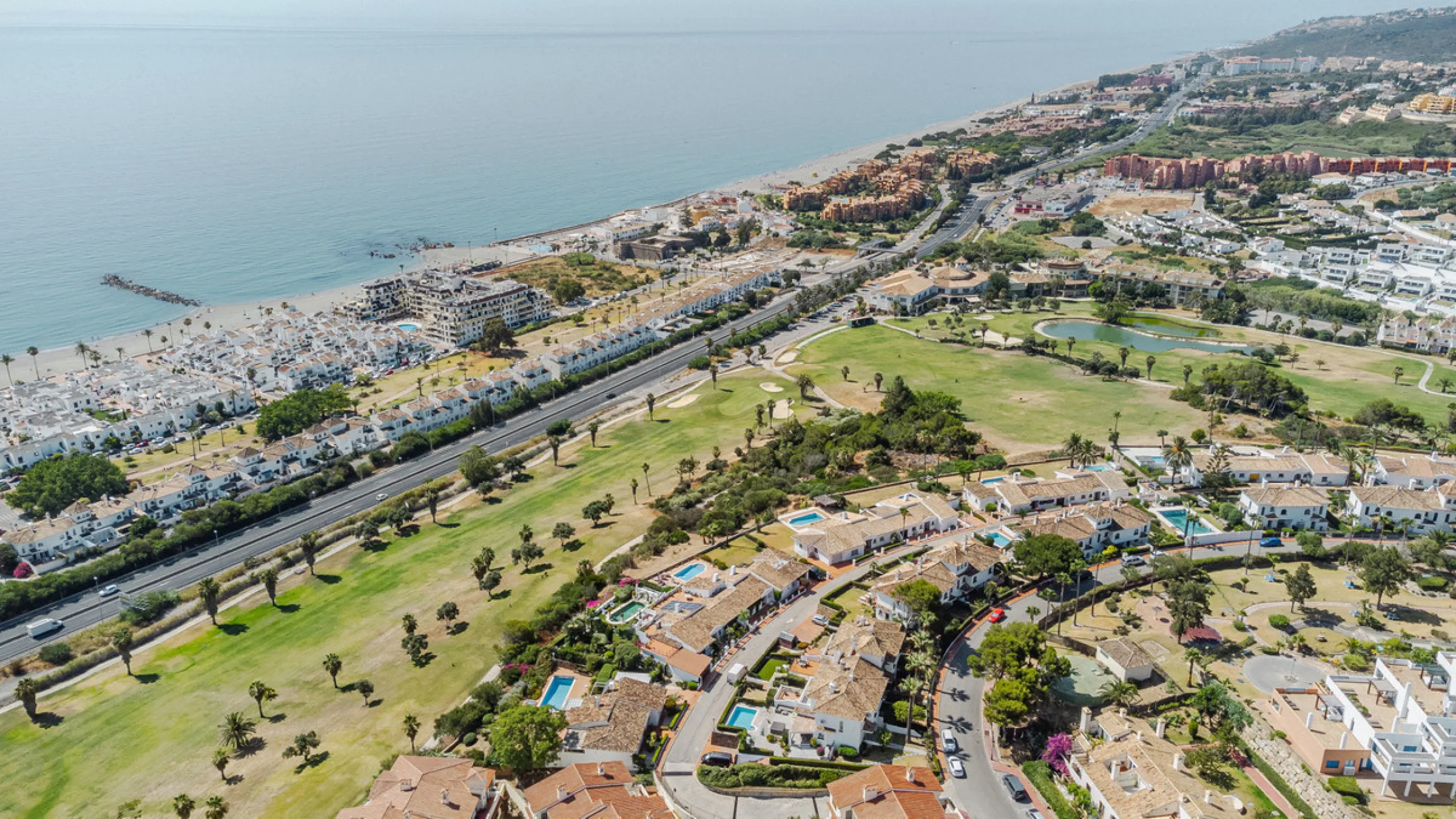 Set on the front line of La Duquesa's golf course, this south-facing semi-detached bungalow combines space, sustainability, and location in one irresistible package. Offering five bedrooms, all with ensuite bathrooms, this is a home designed for comfortab