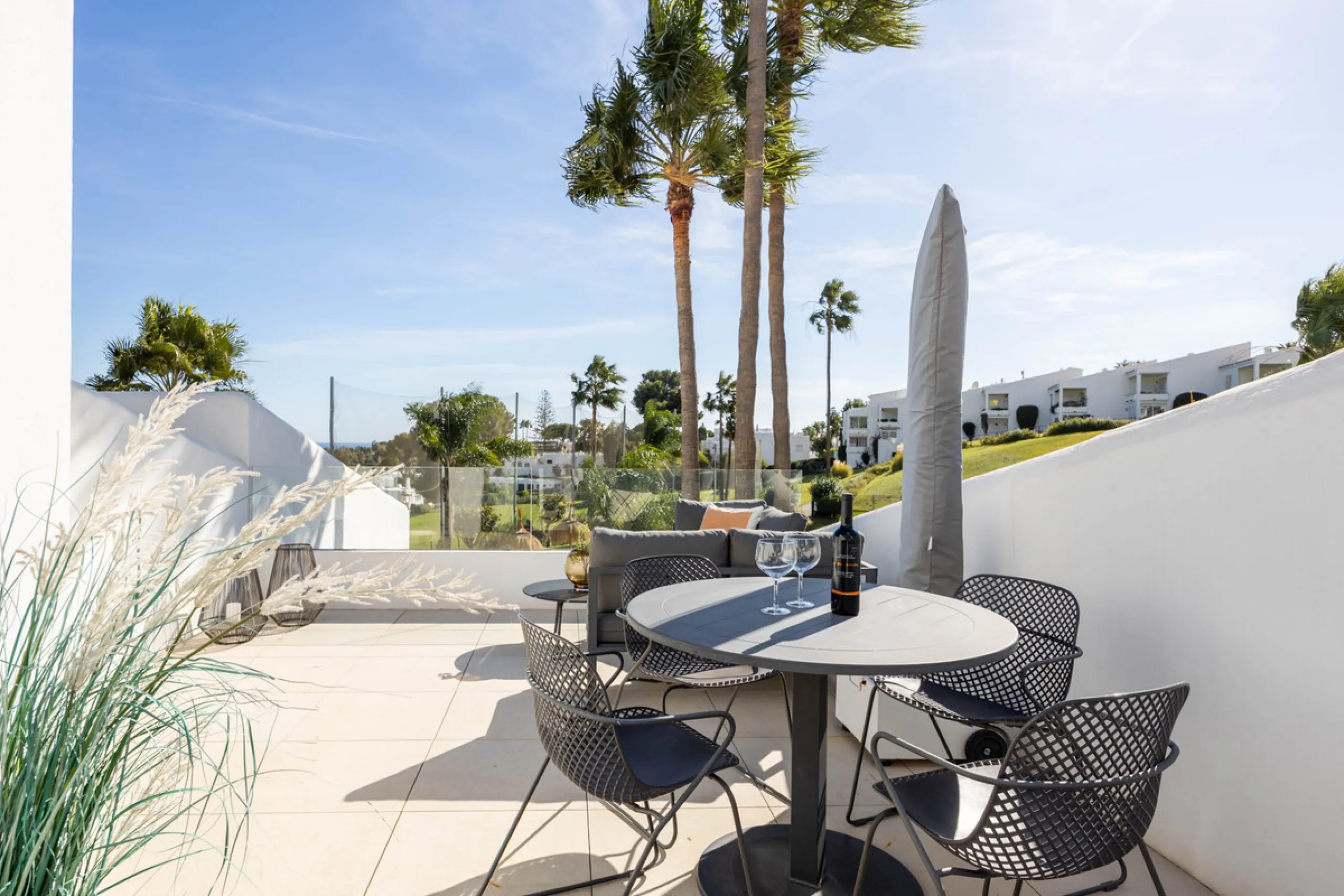 Welcome to this elegant 2-bedroom apartment, ideally positioned on the top floor in the heart of Nueva Andalucía—overlooking the renowned Aloha Golf Course and offering spectacular sea, mountain, and golf views. This thoughtfully renovated home combines m