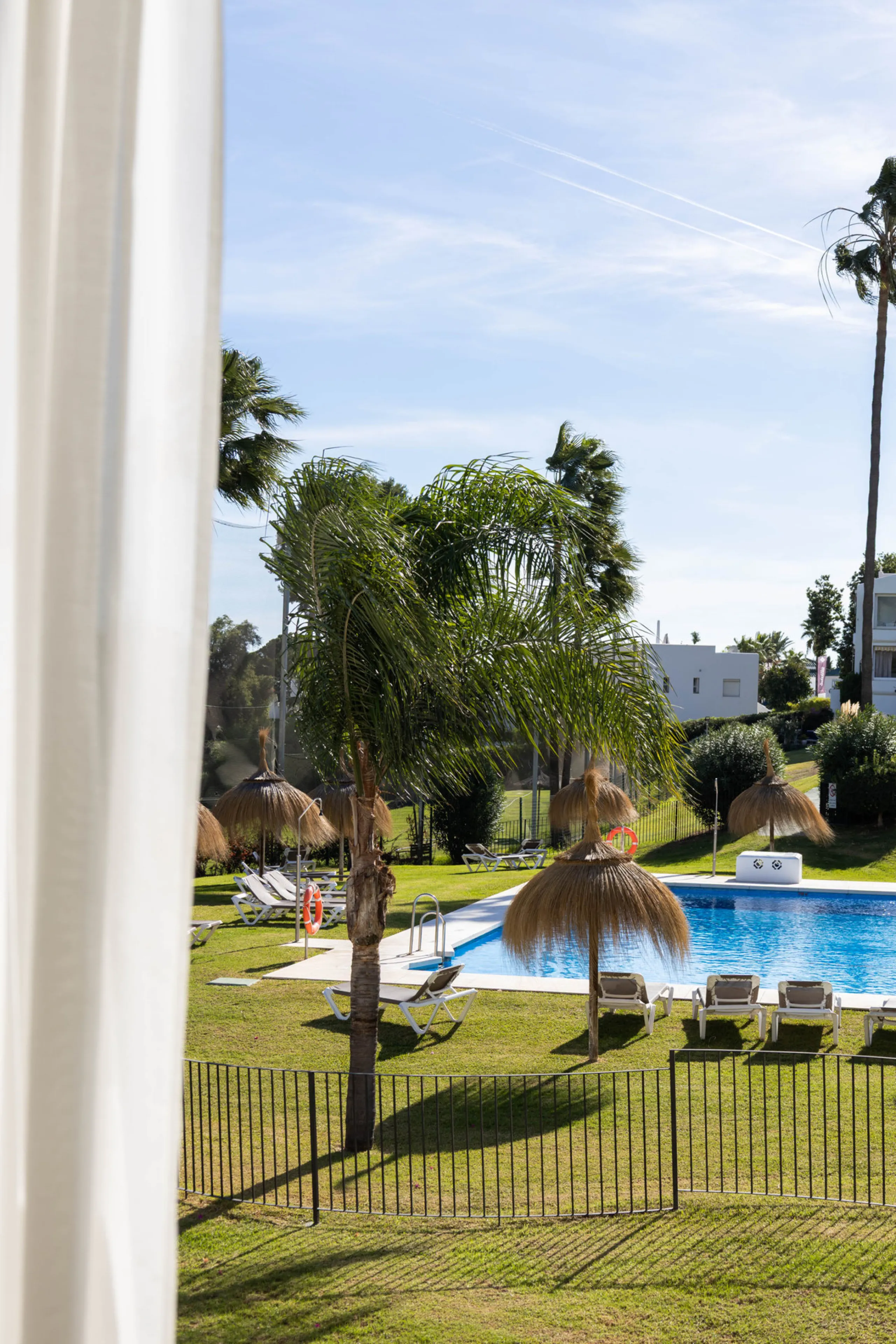 Welcome to this elegant 2-bedroom apartment, ideally positioned on the top floor in the heart of Nueva Andalucía—overlooking the renowned Aloha Golf Course and offering spectacular sea, mountain, and golf views. This thoughtfully renovated home combines m